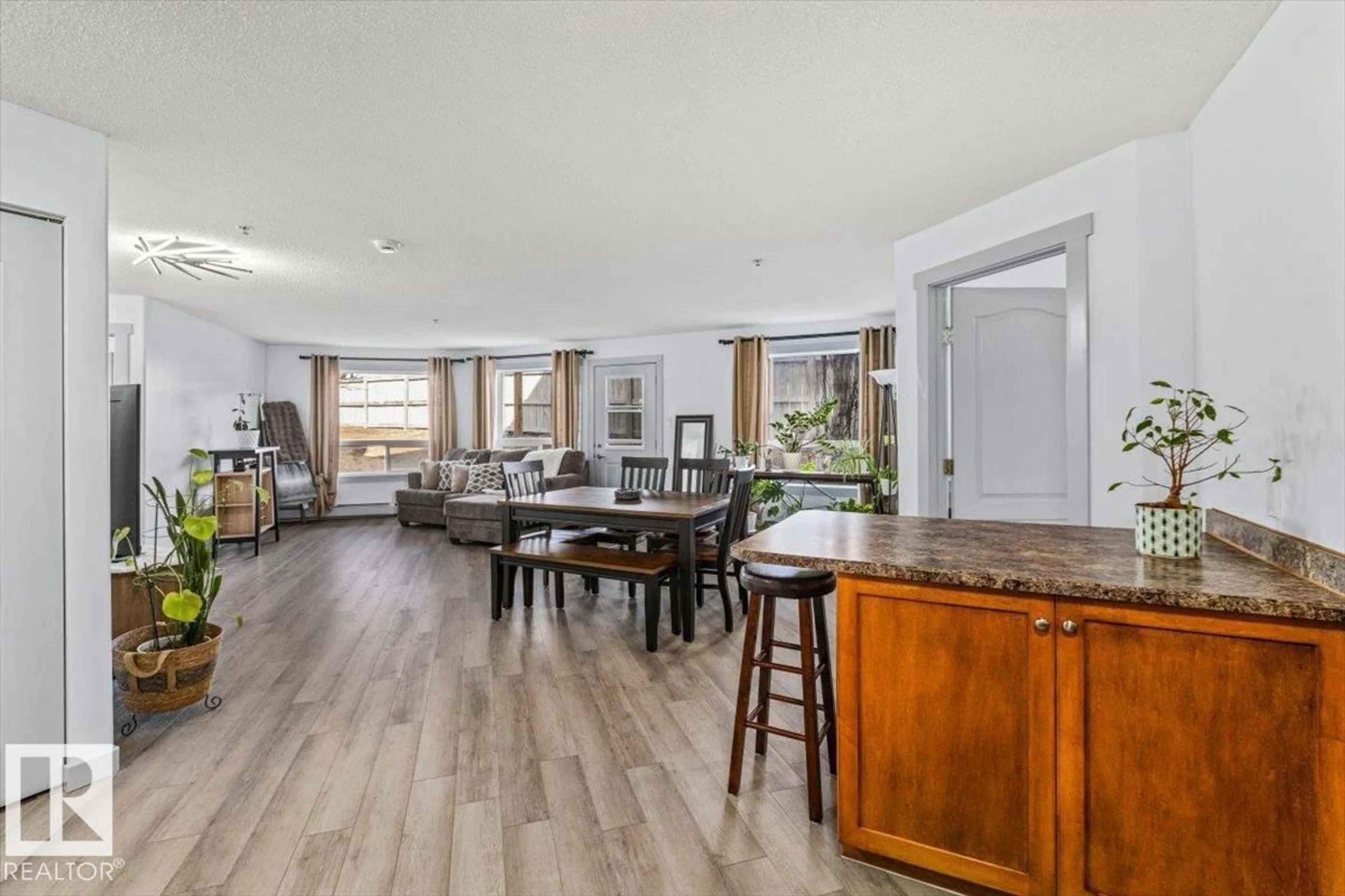 Open concept kitchen, wood/laminate floor for 1110 CLAREVIEW STATION DR, Edmonton Alberta T5Y0E6