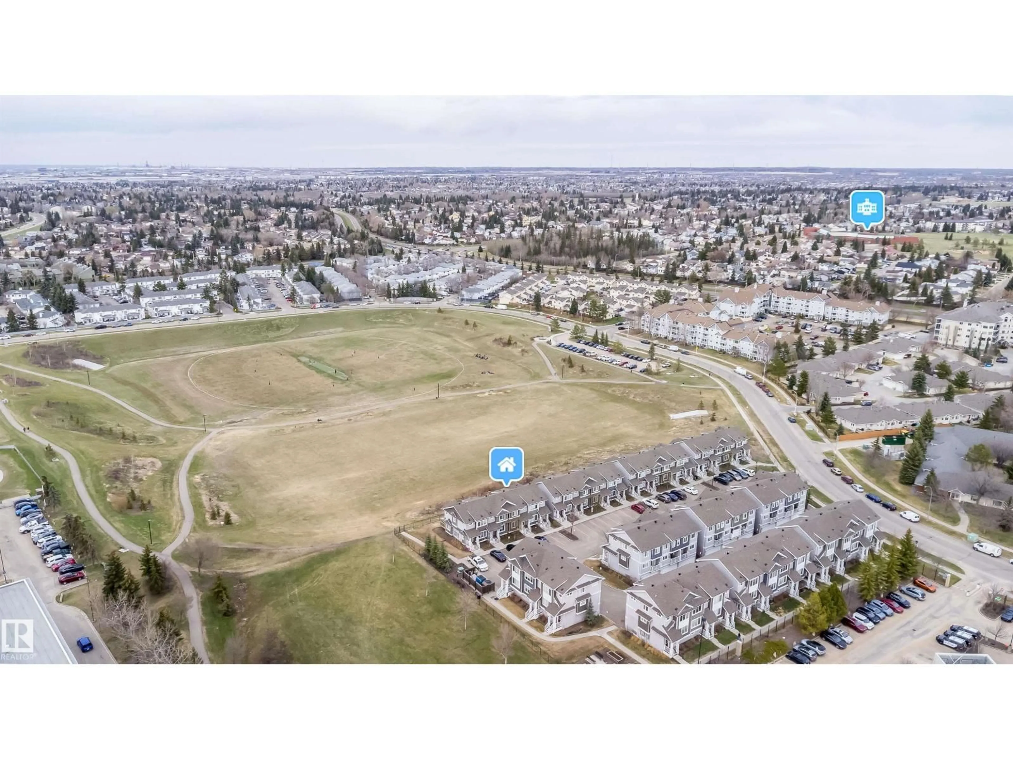 A pic from outside/outdoor area/front of a property/back of a property/a pic from drone, street for 140 - 25 YOUVILLE DR, Edmonton Alberta T6L0A7