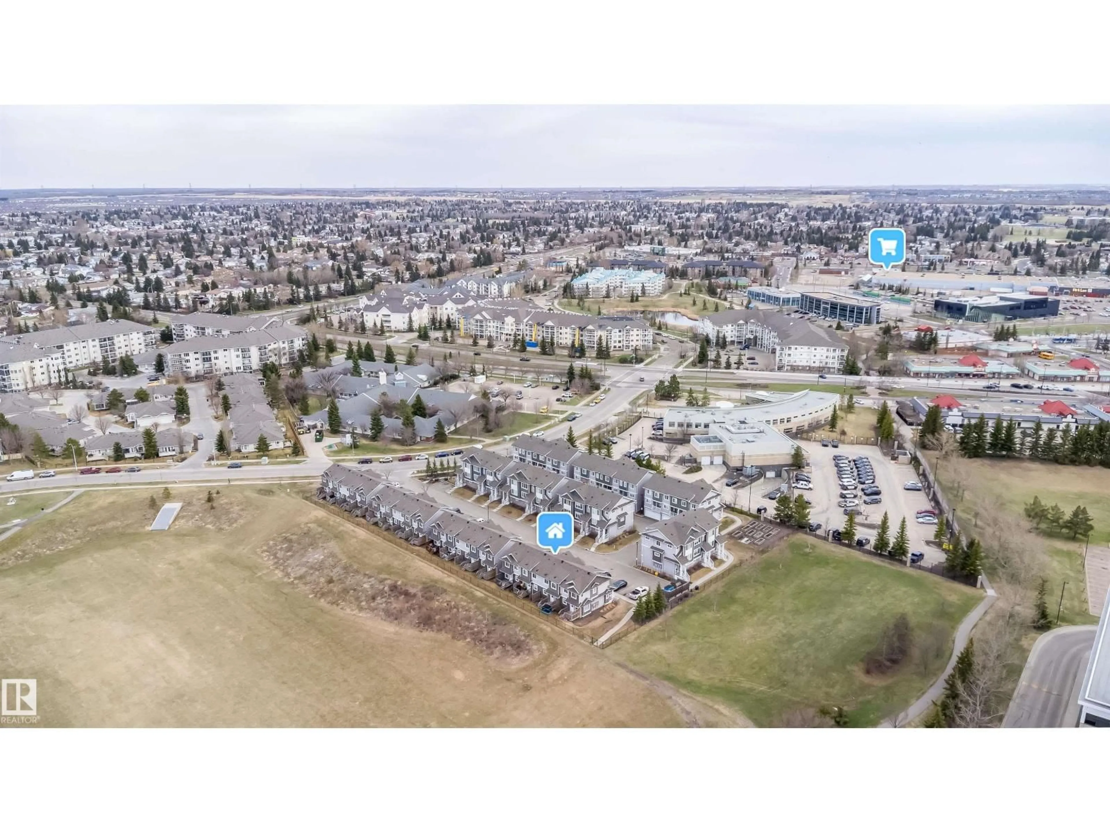 A pic from outside/outdoor area/front of a property/back of a property/a pic from drone, street for 140 - 25 YOUVILLE DR, Edmonton Alberta T6L0A7