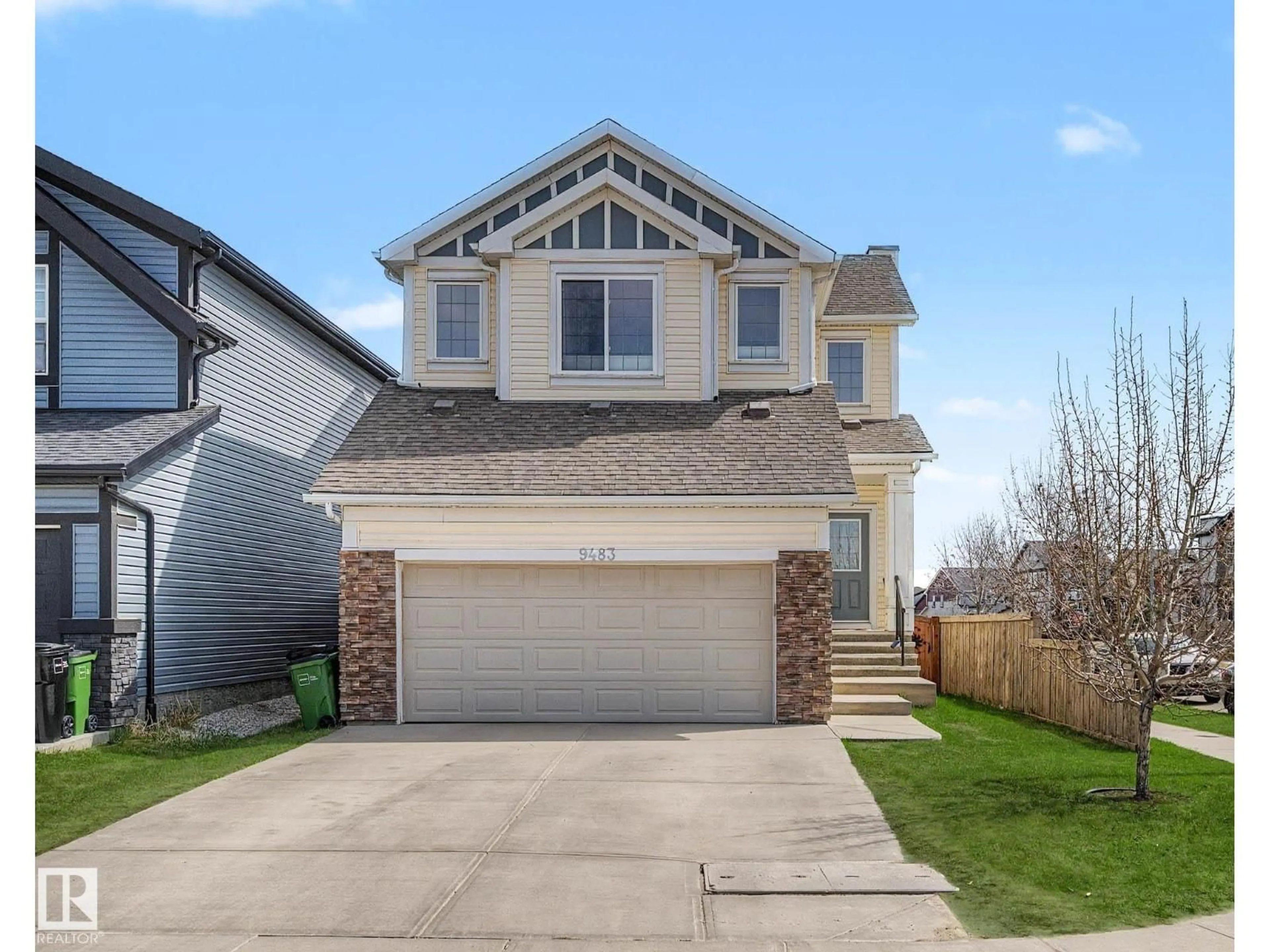 Home with vinyl exterior material, street for NW - 9483 227 ST, Edmonton Alberta T5T7H4