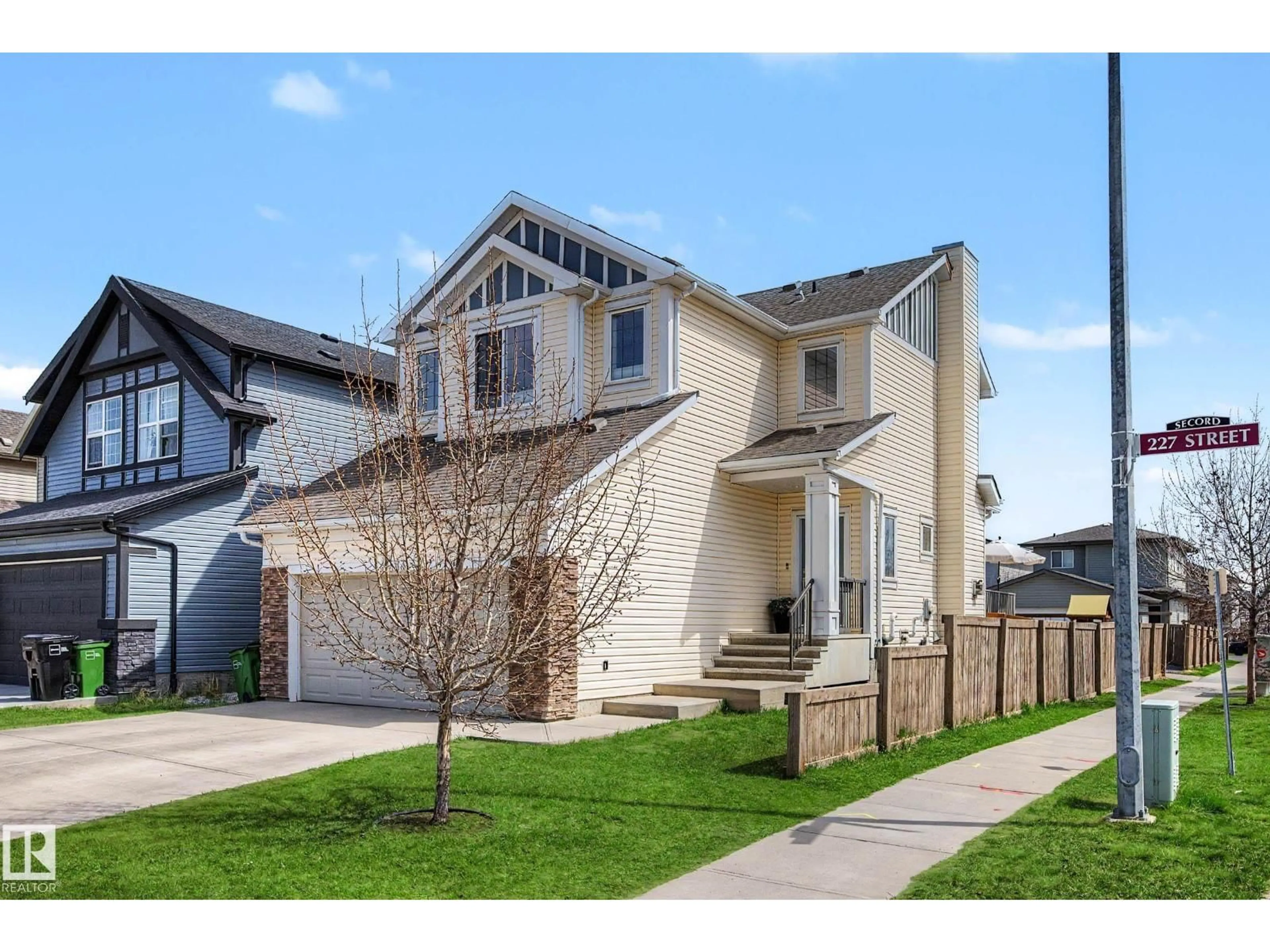 Home with vinyl exterior material, street for NW - 9483 227 ST, Edmonton Alberta T5T7H4