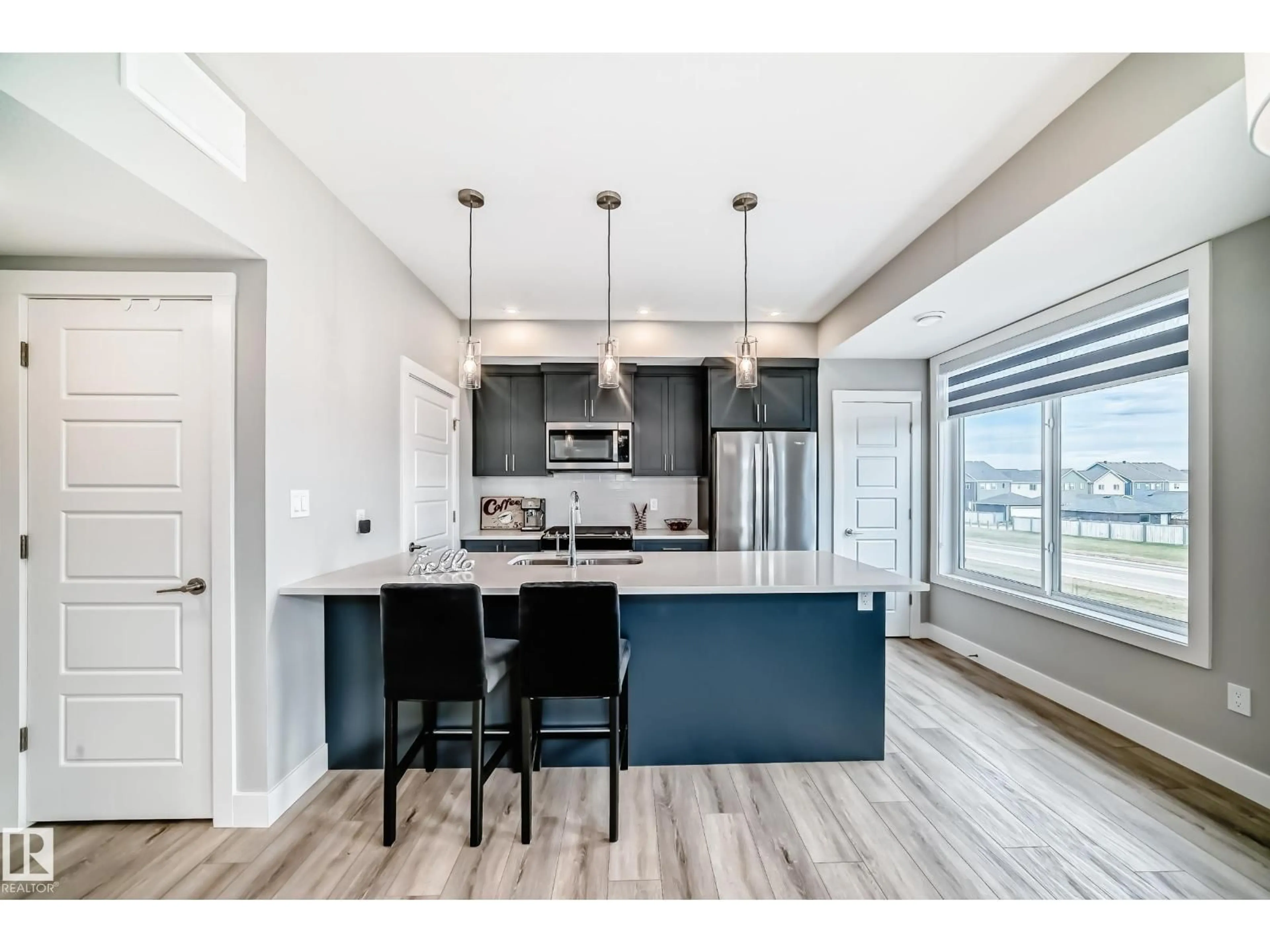 Open concept kitchen, unknown for #50 - 6905 25 AV, Edmonton Alberta T6X3B7
