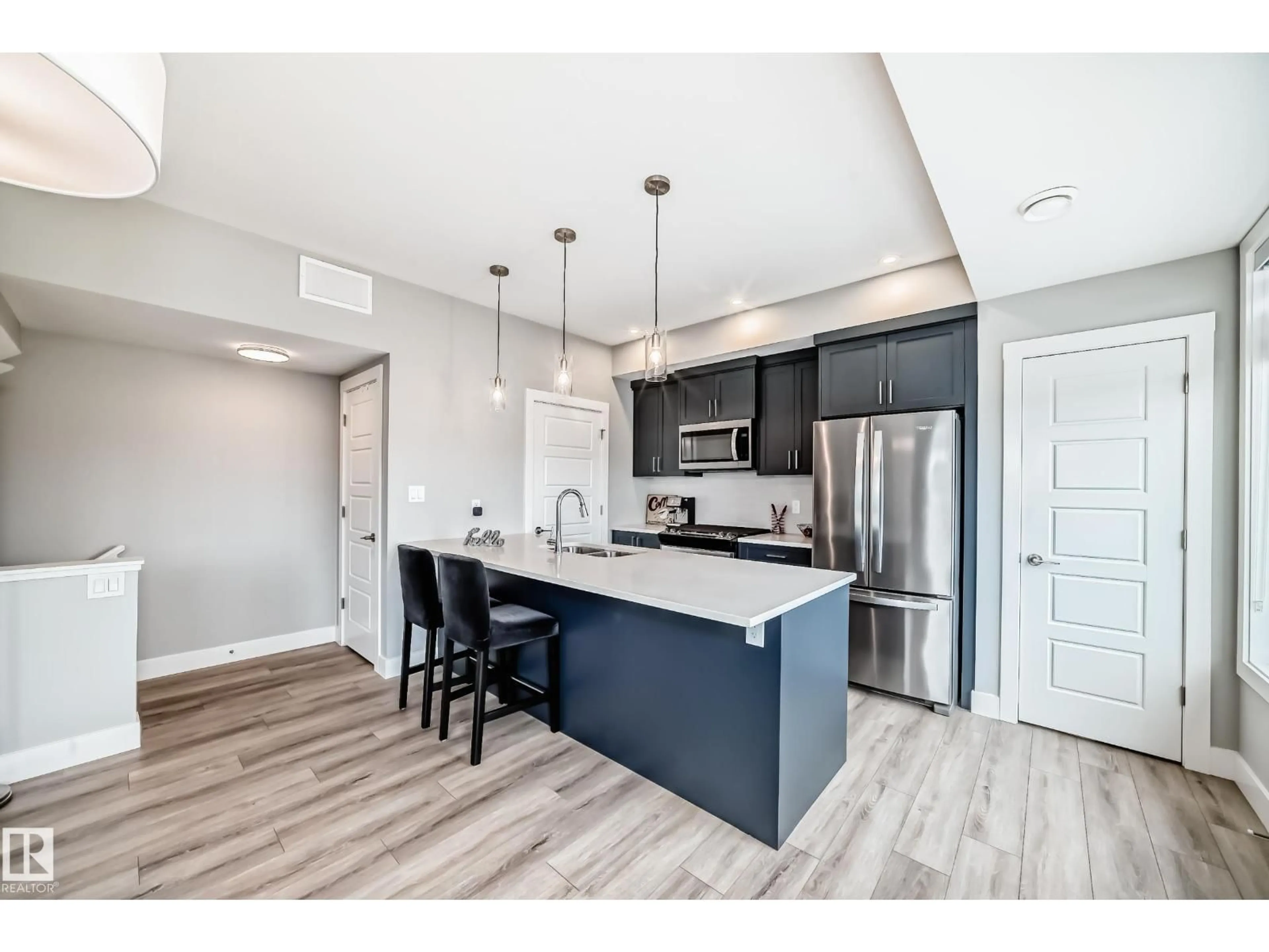Open concept kitchen, unknown for #50 - 6905 25 AV, Edmonton Alberta T6X3B7