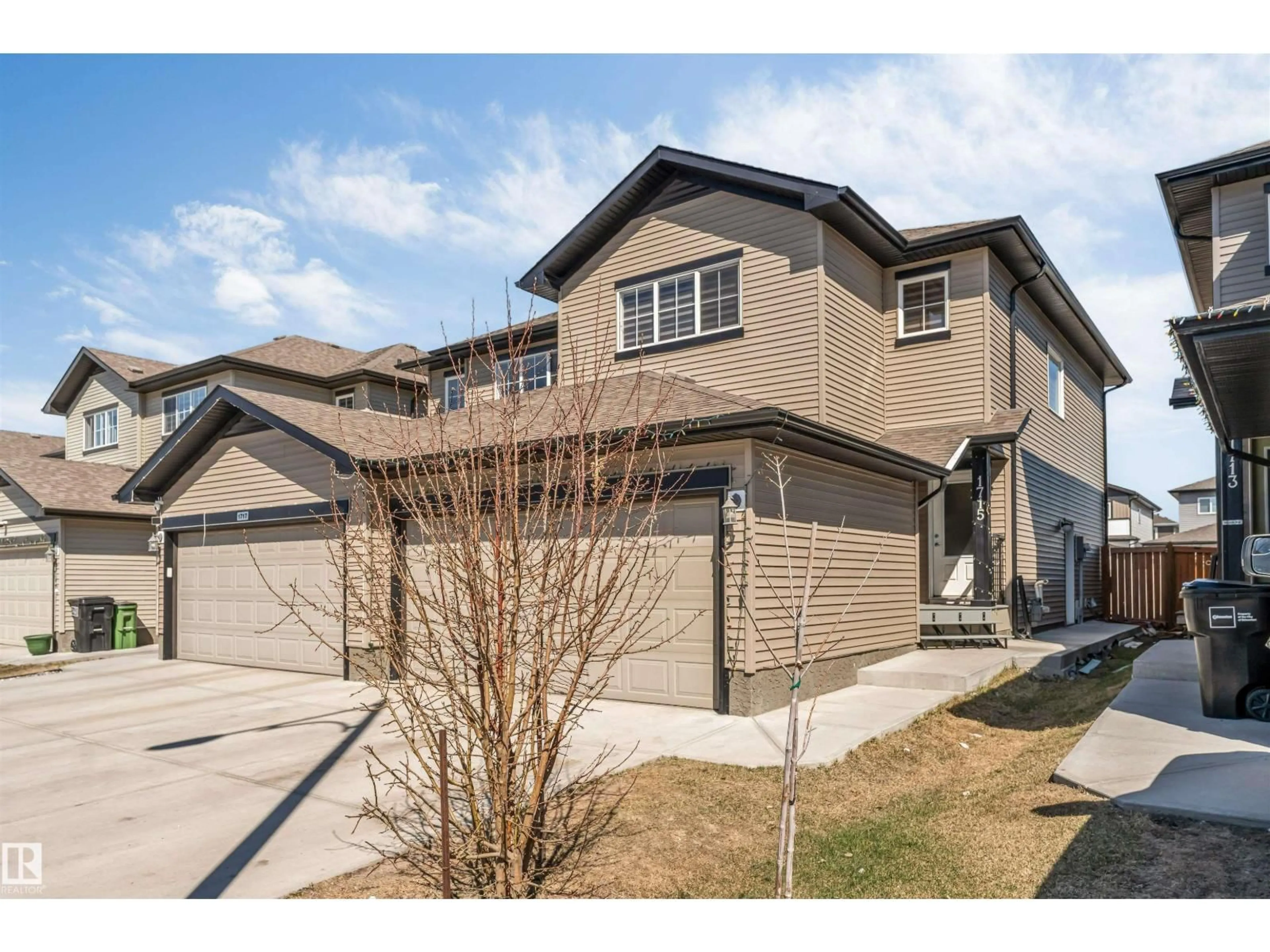 Home with vinyl exterior material, street for 1715 27 ST, Edmonton Alberta T6T2G6