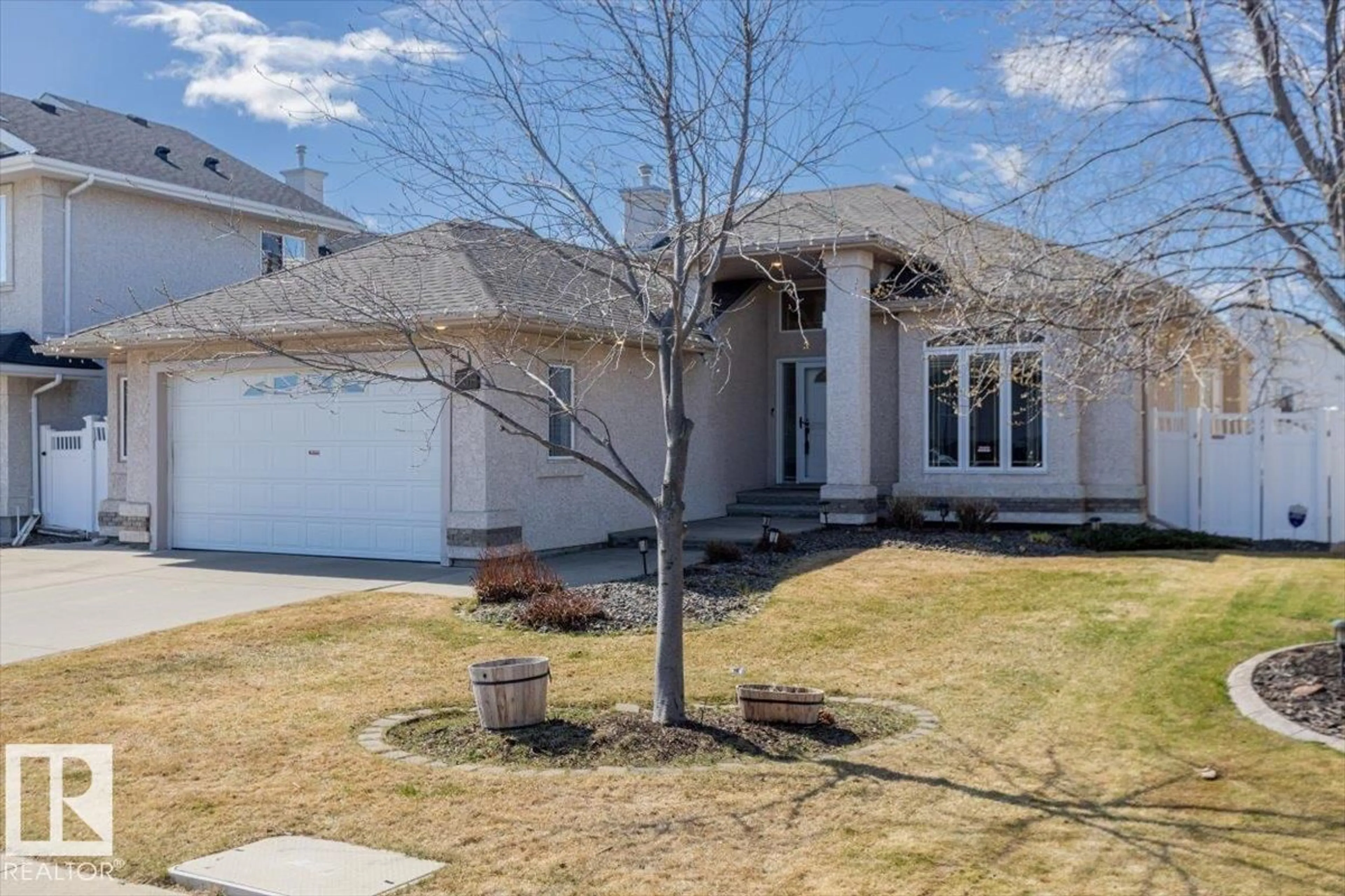 Home with vinyl exterior material, street for 7719 166 AV, Edmonton Alberta T5Z3V8