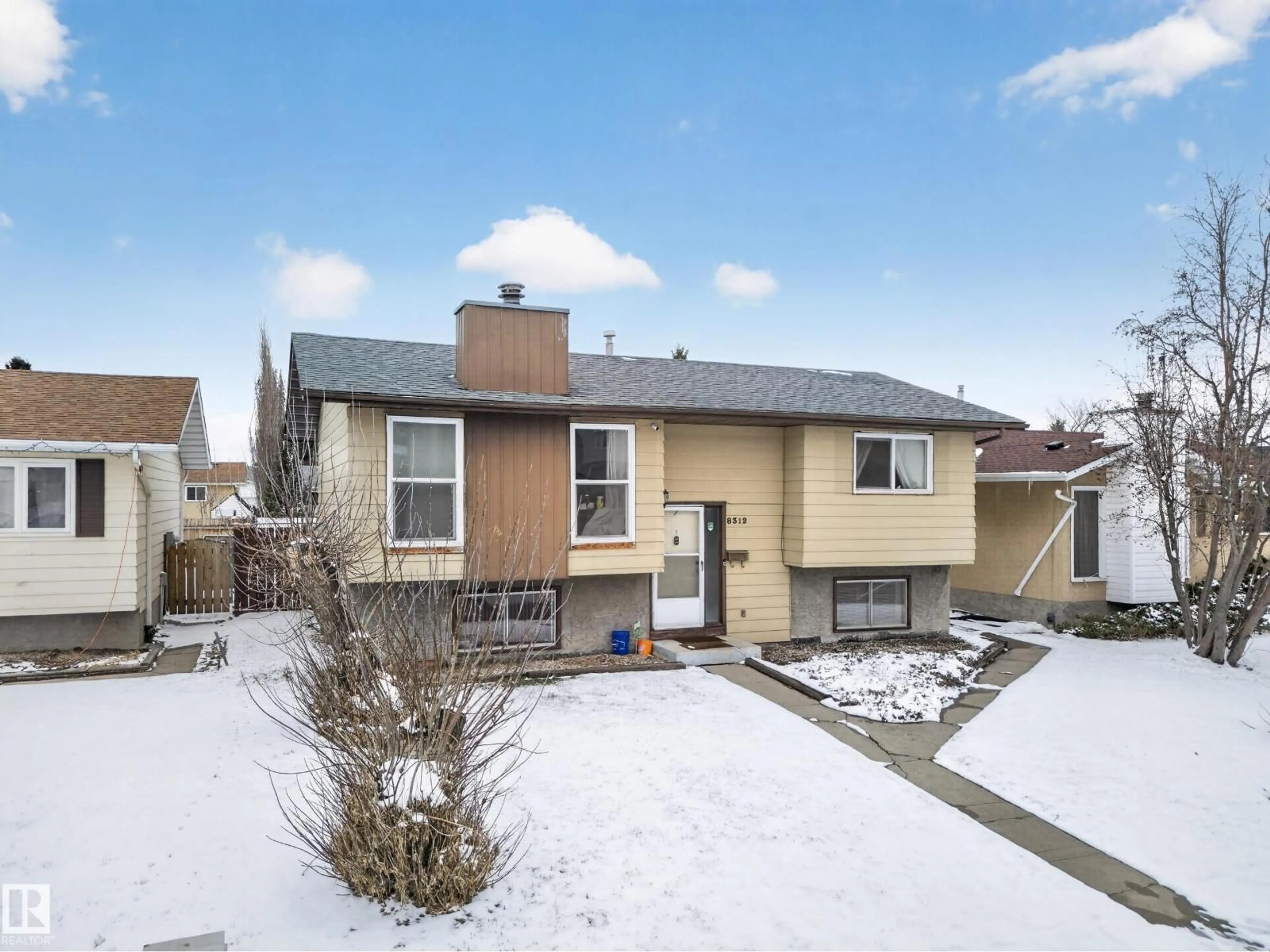 Home with vinyl exterior material, street for 8312 29 AVE, Edmonton Alberta T6K3V6