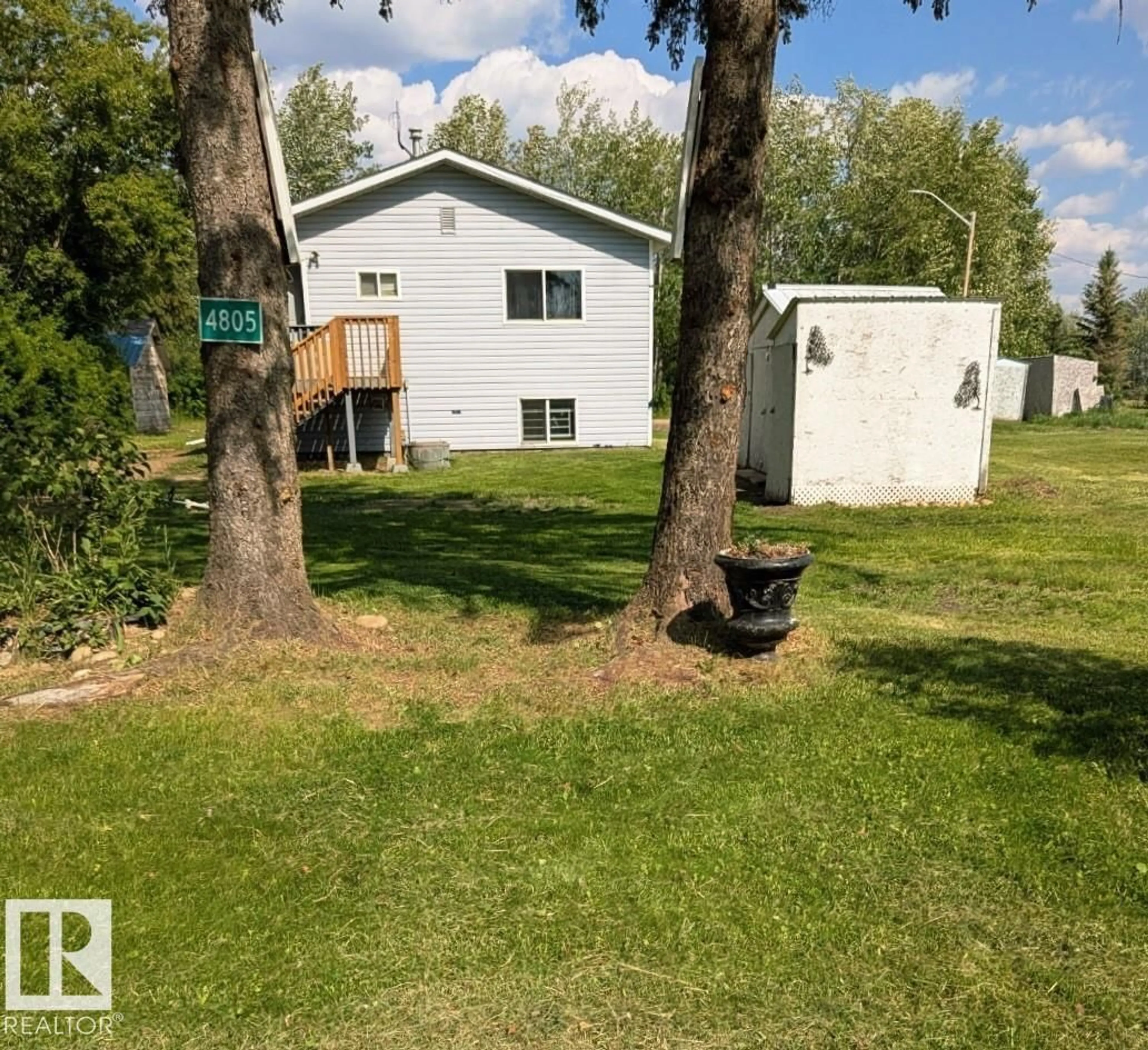 A pic from outside/outdoor area/front of a property/back of a property/a pic from drone, water/lake/river/ocean view for 4805 50, Pibroch Alberta T7P2P6