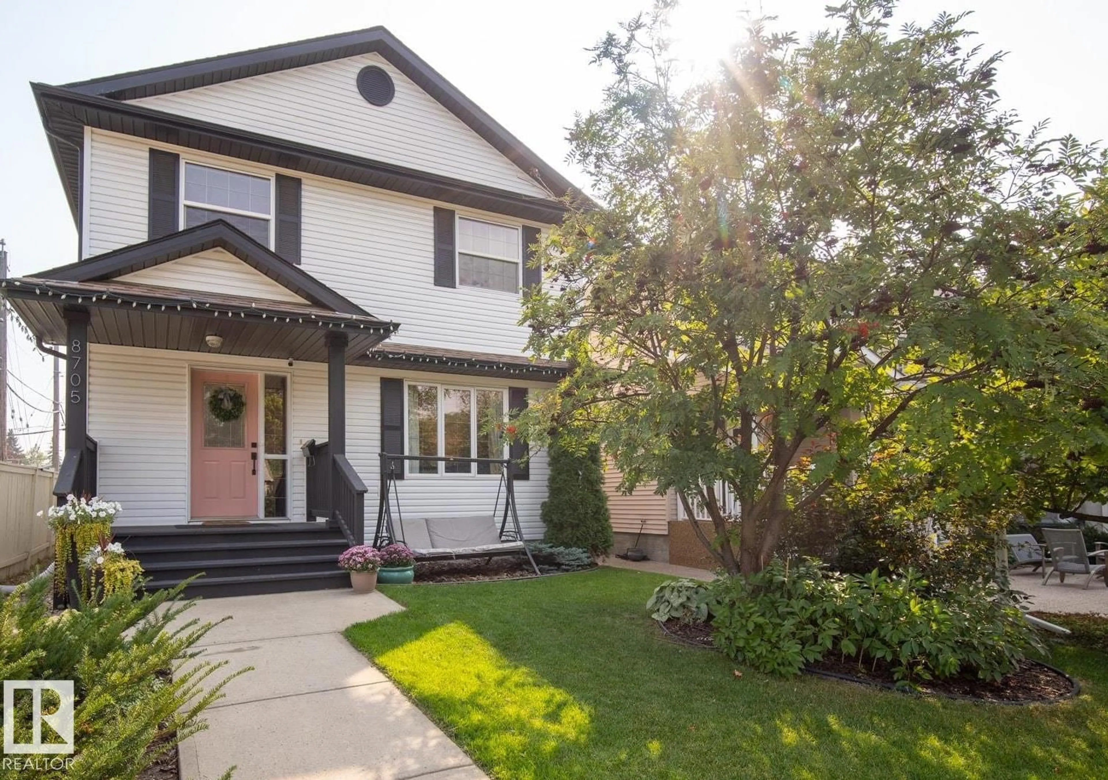 Home with vinyl exterior material, street for 8705 92A AV, Edmonton Alberta T6C4G6