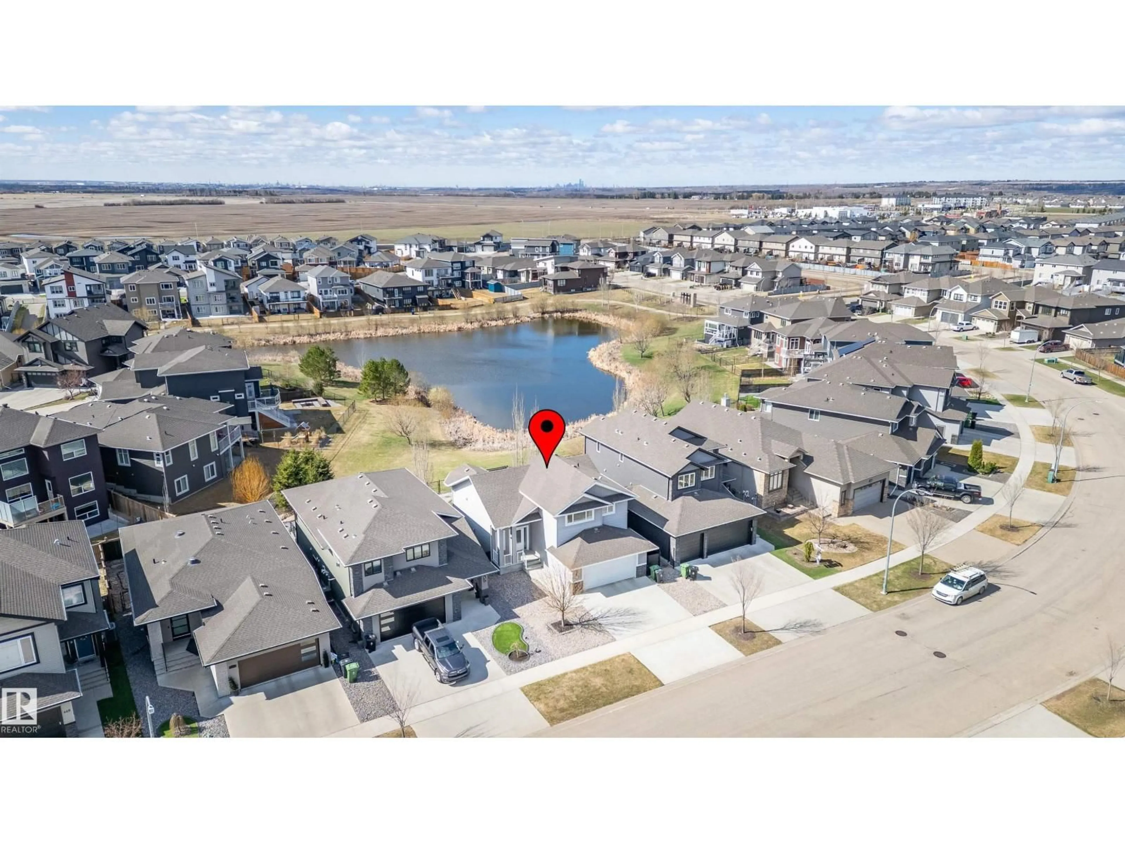 A pic from outside/outdoor area/front of a property/back of a property/a pic from drone, water/lake/river/ocean view for 437 MEADOWVIEW DR, Fort Saskatchewan Alberta T8L0N9