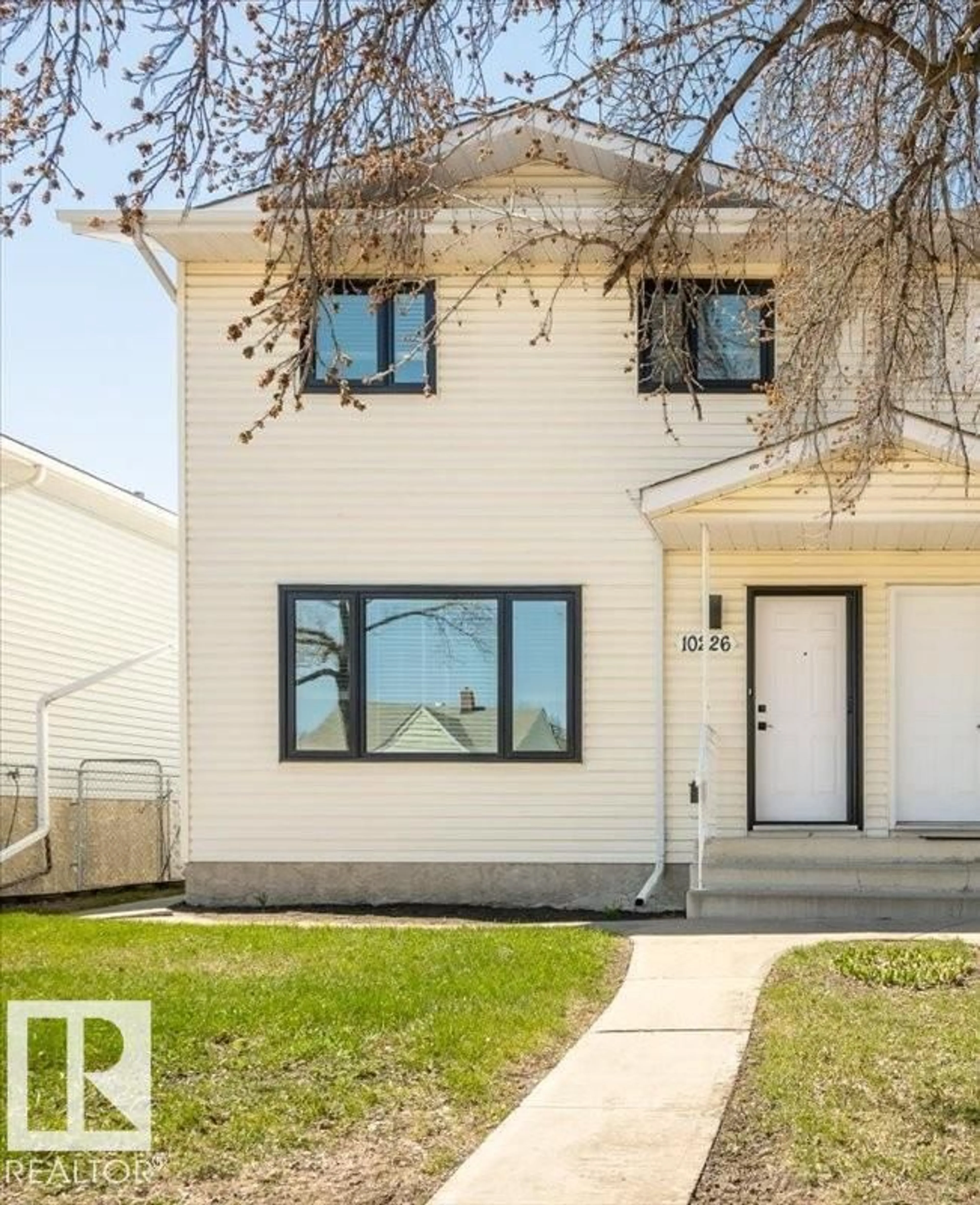 Home with vinyl exterior material, street for 10226 152 ST, Edmonton Alberta T5P1Y2