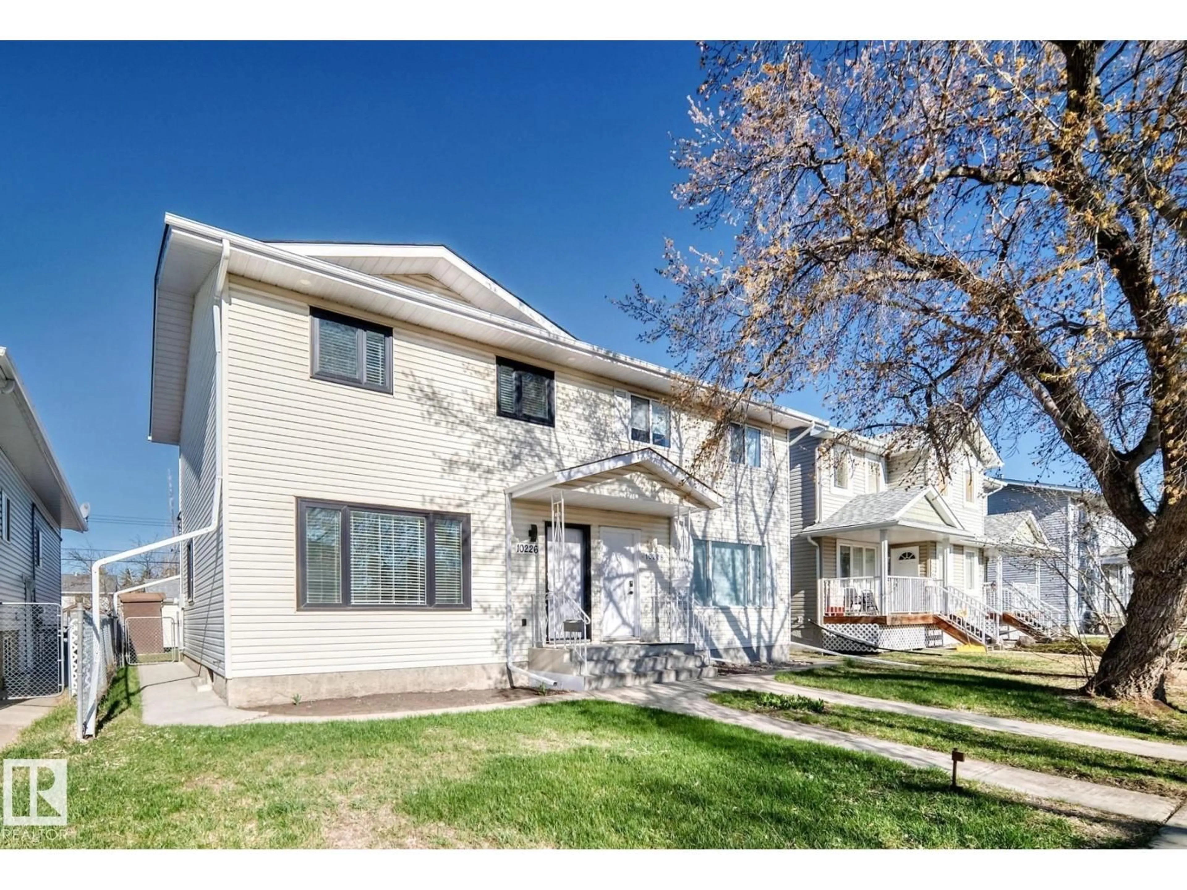 Home with vinyl exterior material, street for 10226 152 ST, Edmonton Alberta T5P1Y2