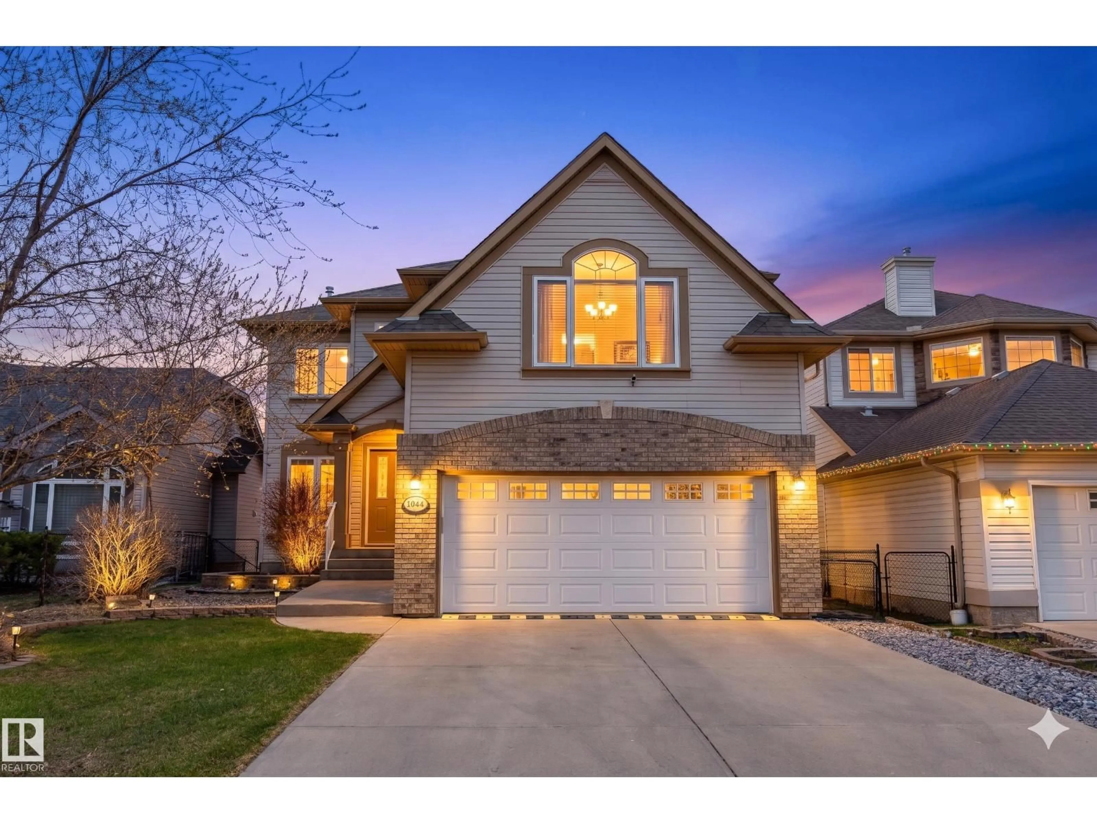 Home with brick exterior material, street for 1044 BARNES WY, Edmonton Alberta T6W1E4
