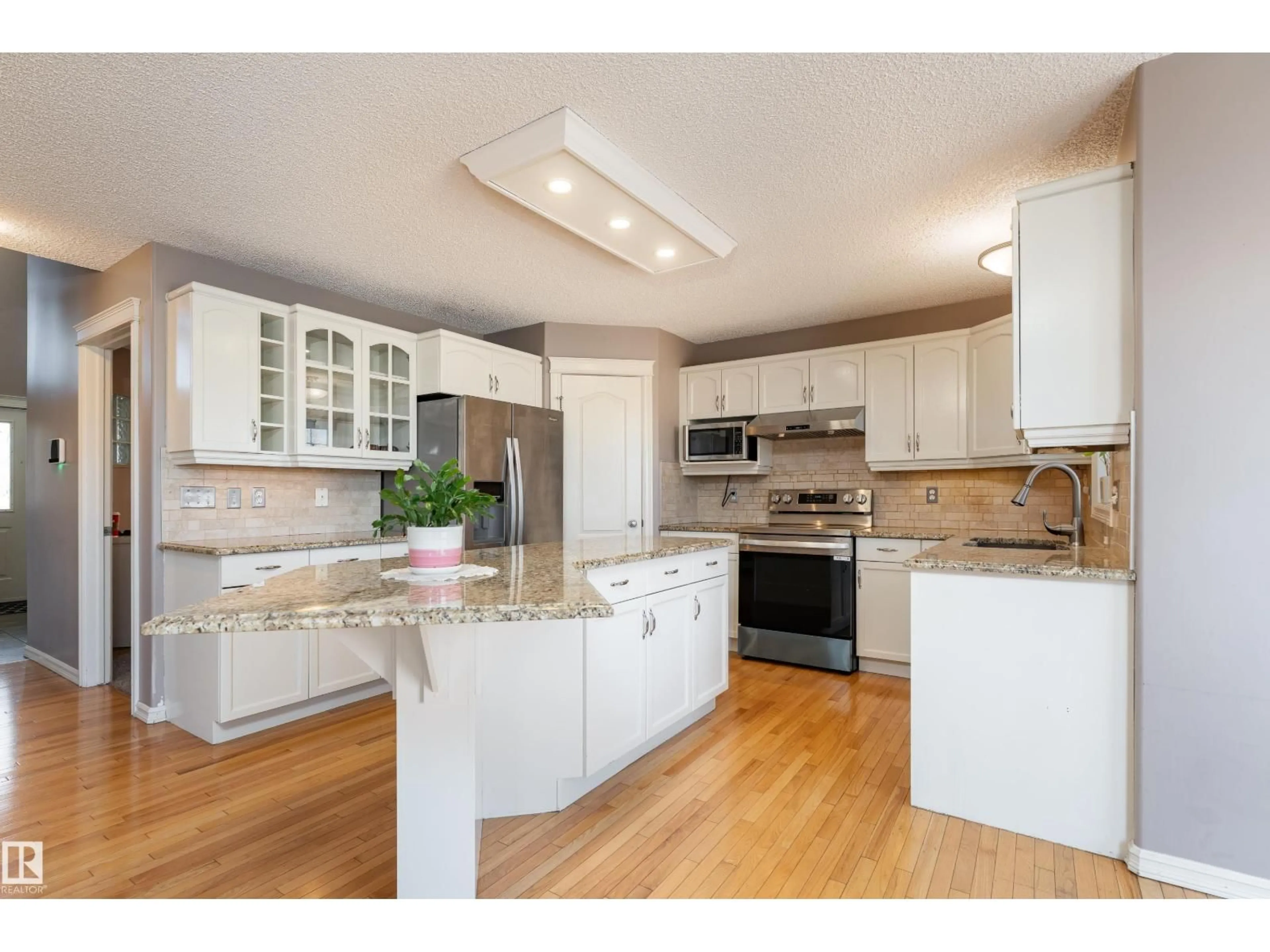 Open concept kitchen, unknown for 1044 BARNES WY, Edmonton Alberta T6W1E4