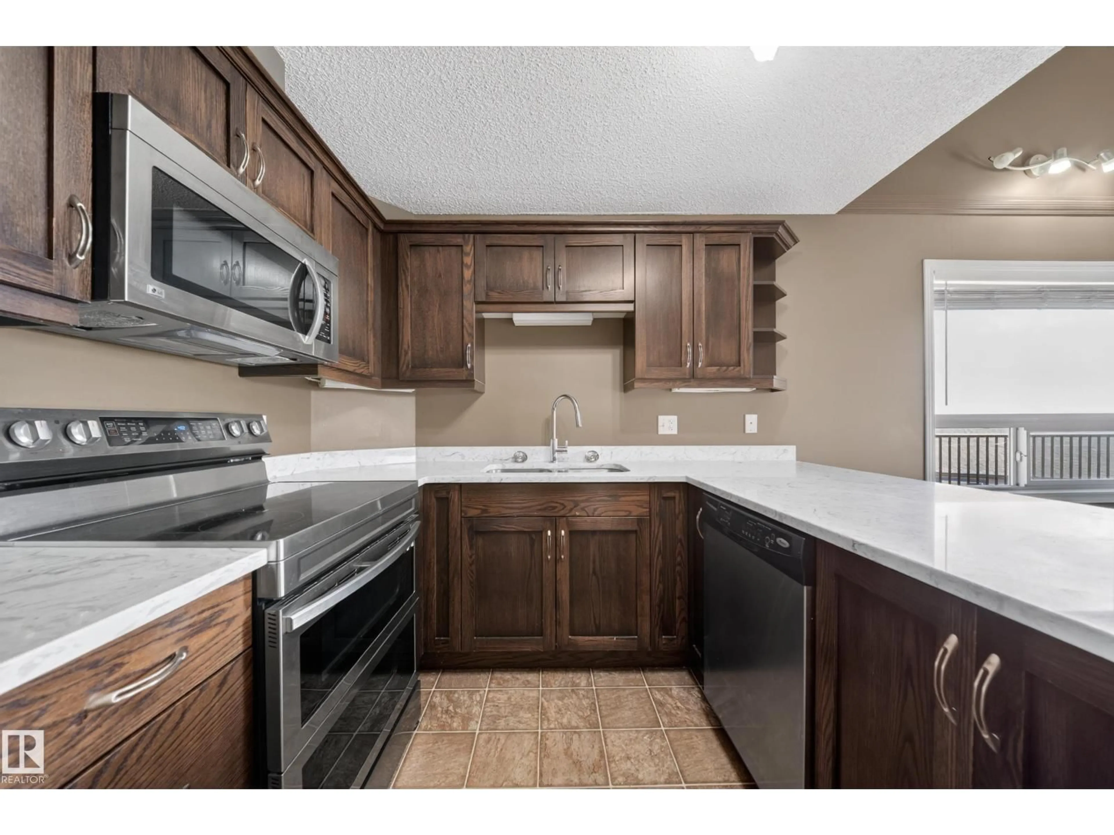 Standard kitchen, ceramic/tile floor for #435 - 1520 HAMMOND GA, Edmonton Alberta T6M0J4