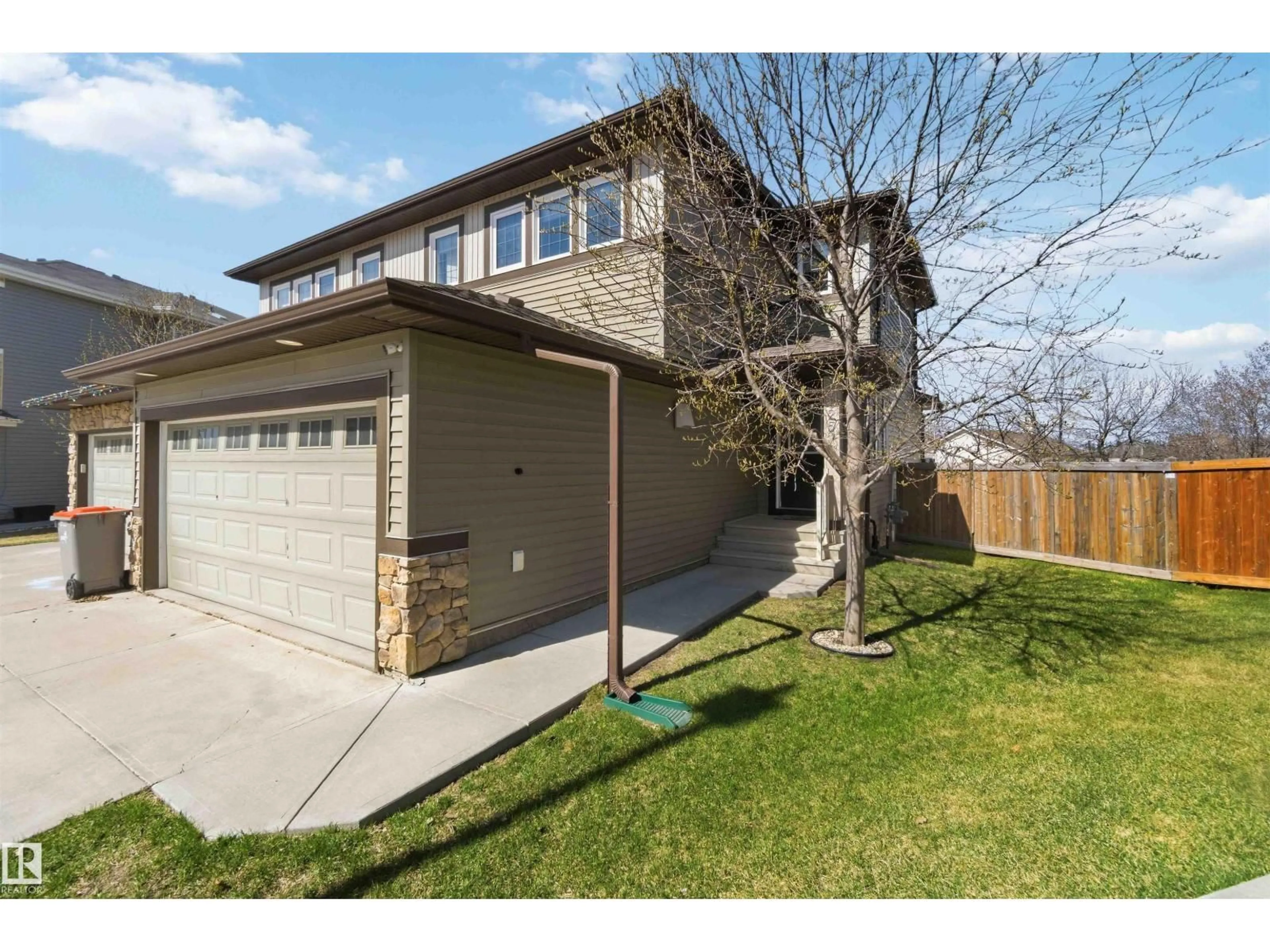 Home with brick exterior material, street for 1825 WESTERRA LO, Stony Plain Alberta T7Z0L8