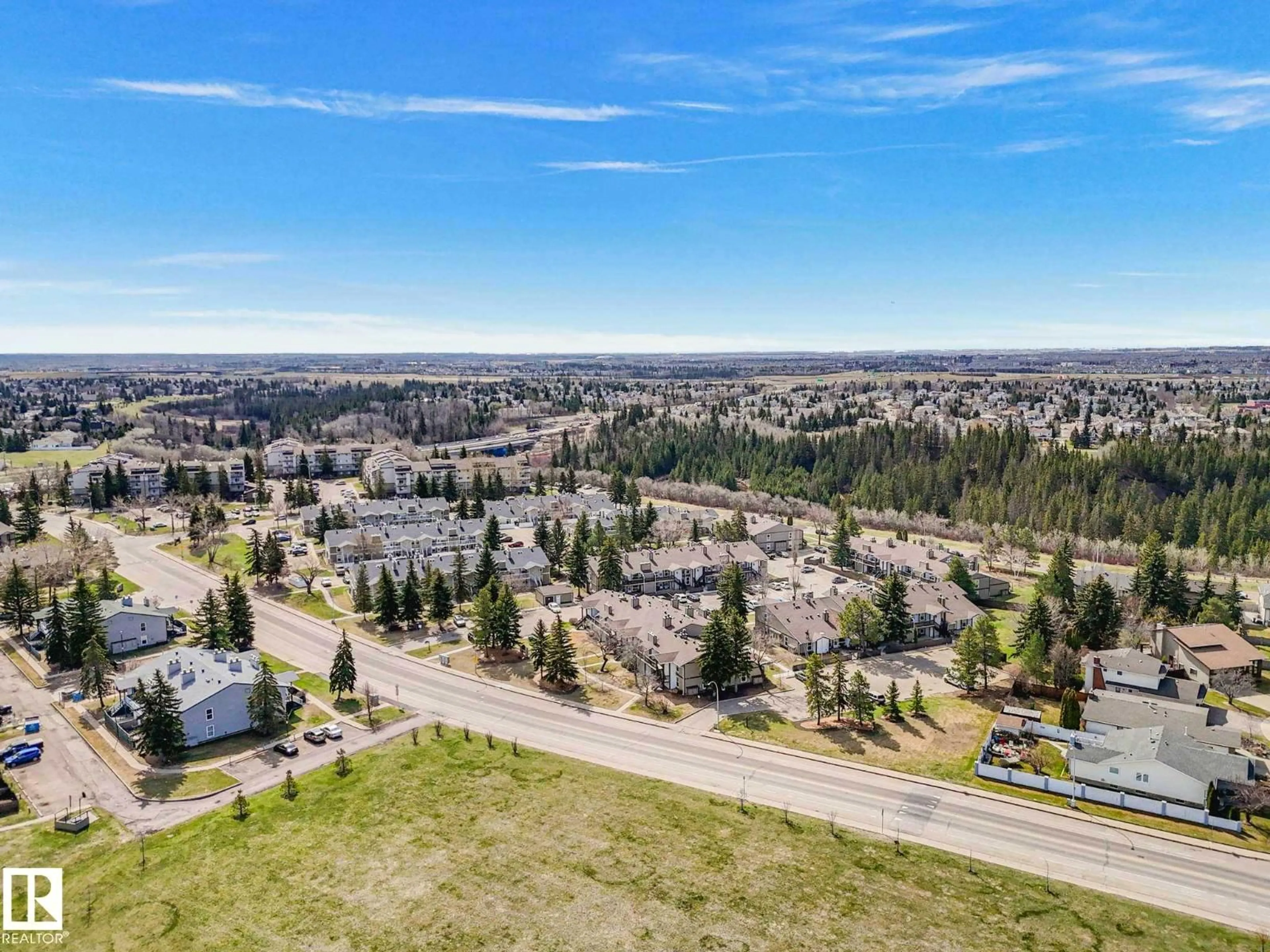 A pic from outside/outdoor area/front of a property/back of a property/a pic from drone, mountain view for 1102 SADDLEBACK RD, Edmonton Alberta T6J4Z4