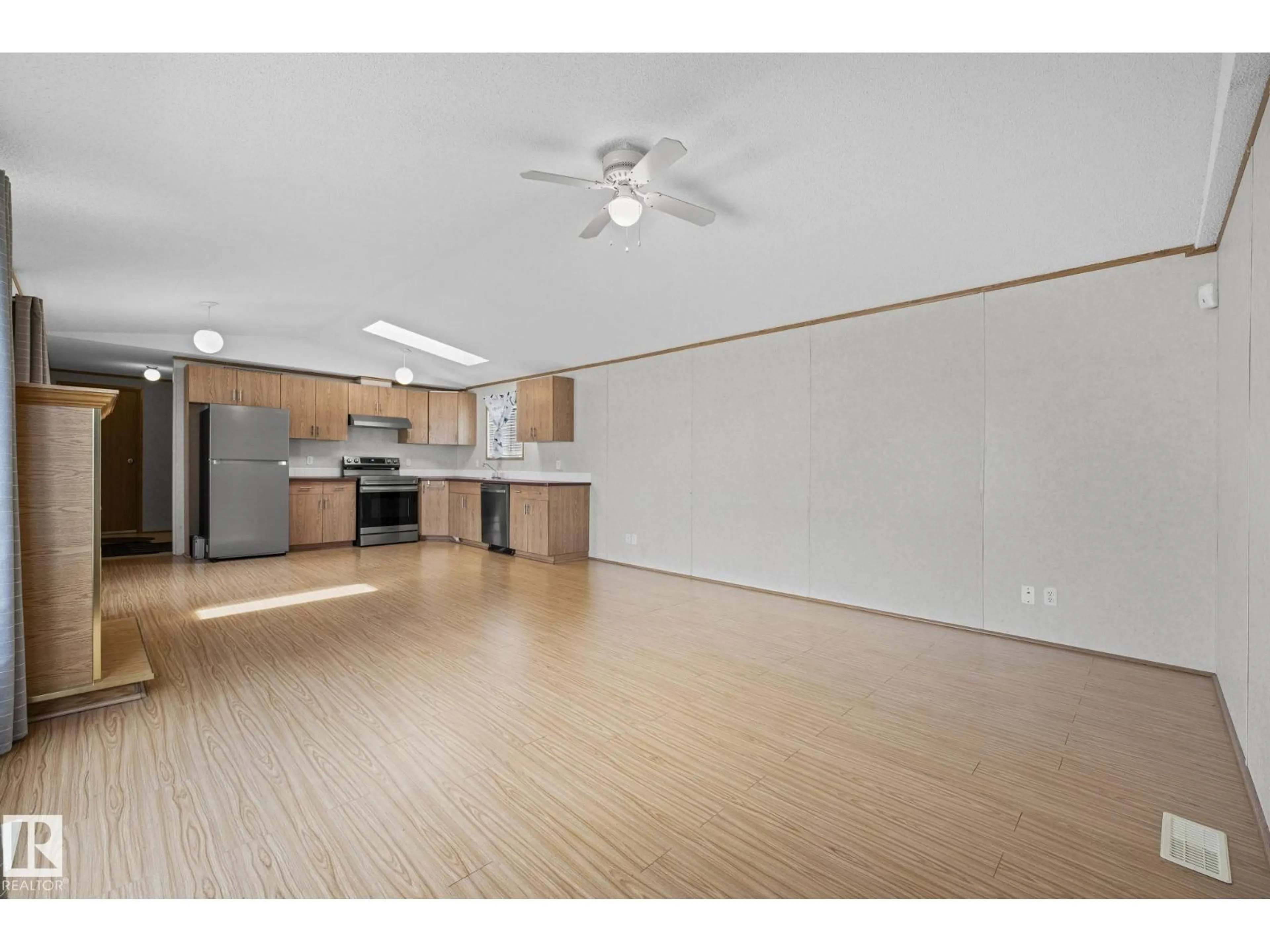 Open concept kitchen, wood/laminate floor for 623 EVERGREEN PARK NE, Edmonton Alberta T5Y4M2
