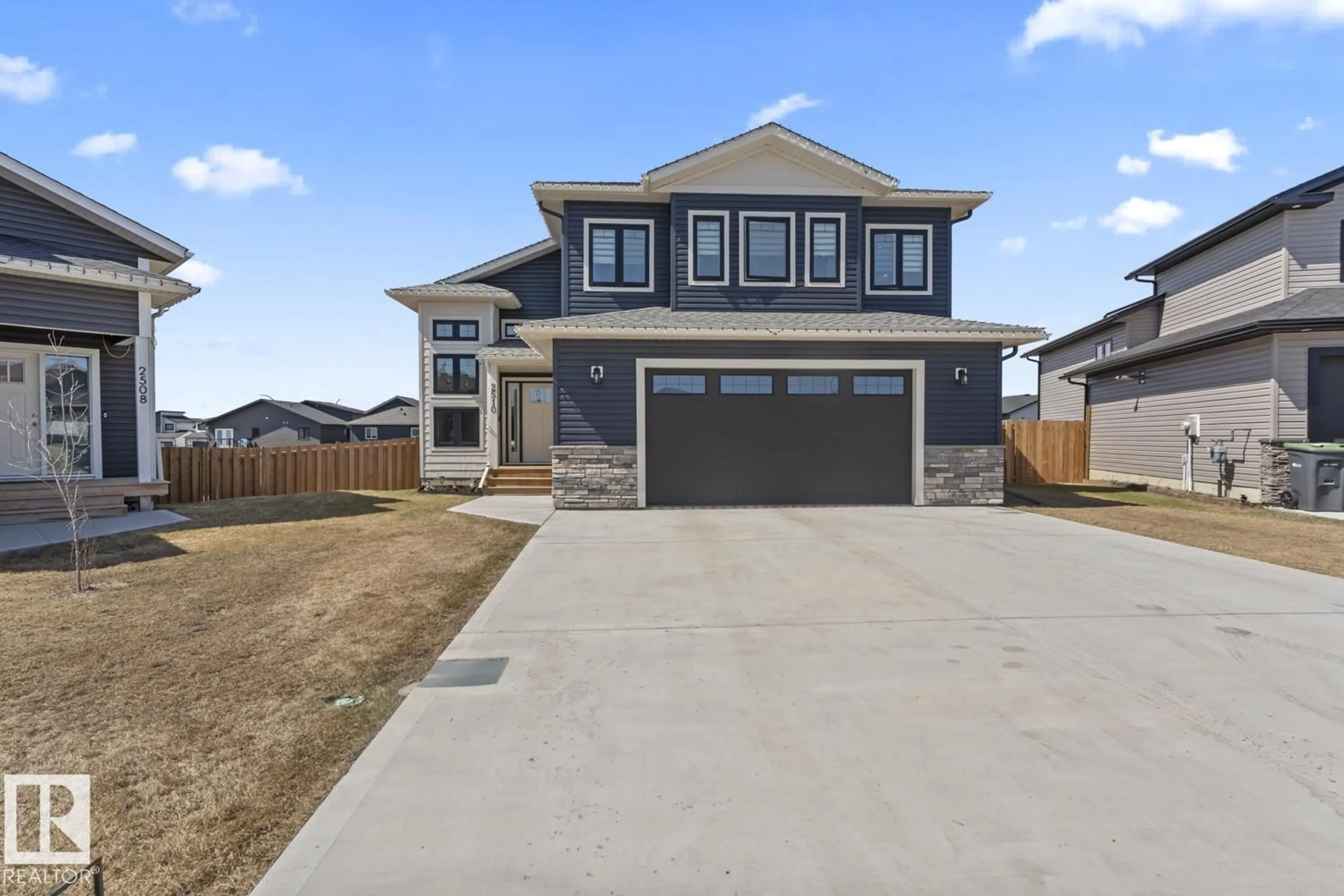 Home with vinyl exterior material, street for IN - 2510 YOHO, Cold Lake Alberta T9M0K1