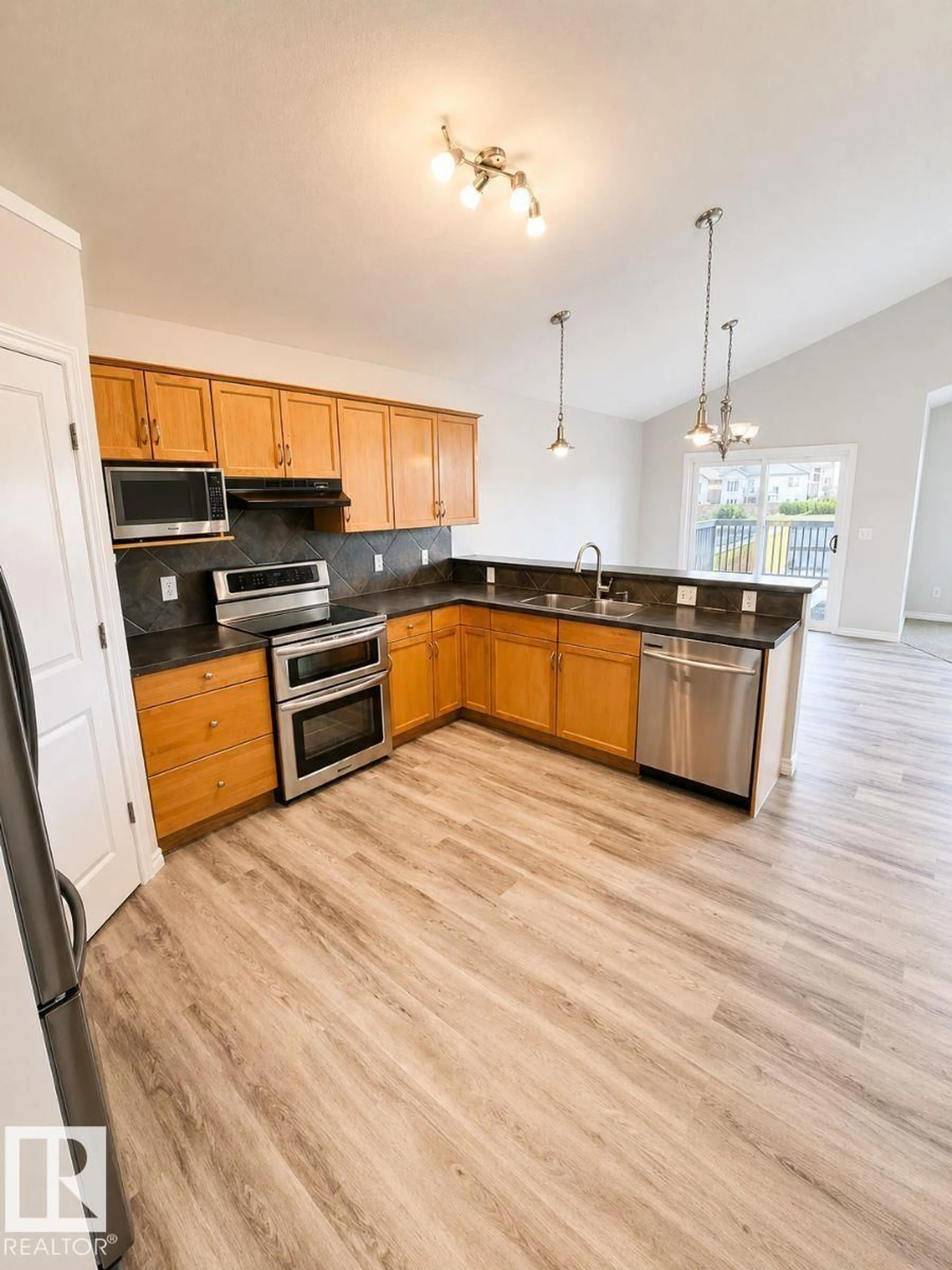 Open concept kitchen, unknown for 277 BIRCHWOOD DR, Devon Alberta T9G2H9