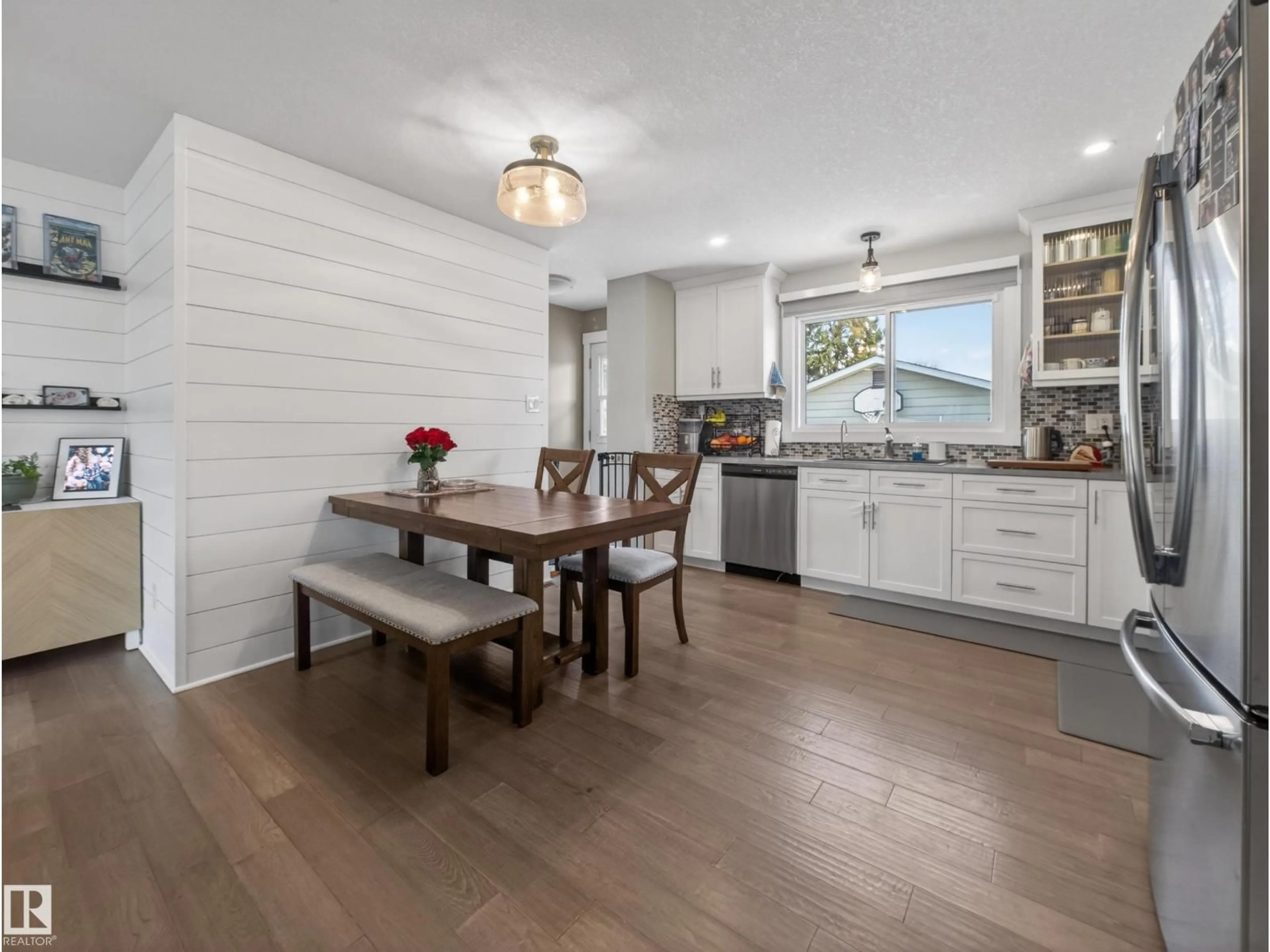 Open concept kitchen, wood/laminate floor for 28 GLENGARRY CR, Sherwood Park Alberta T8A3A2