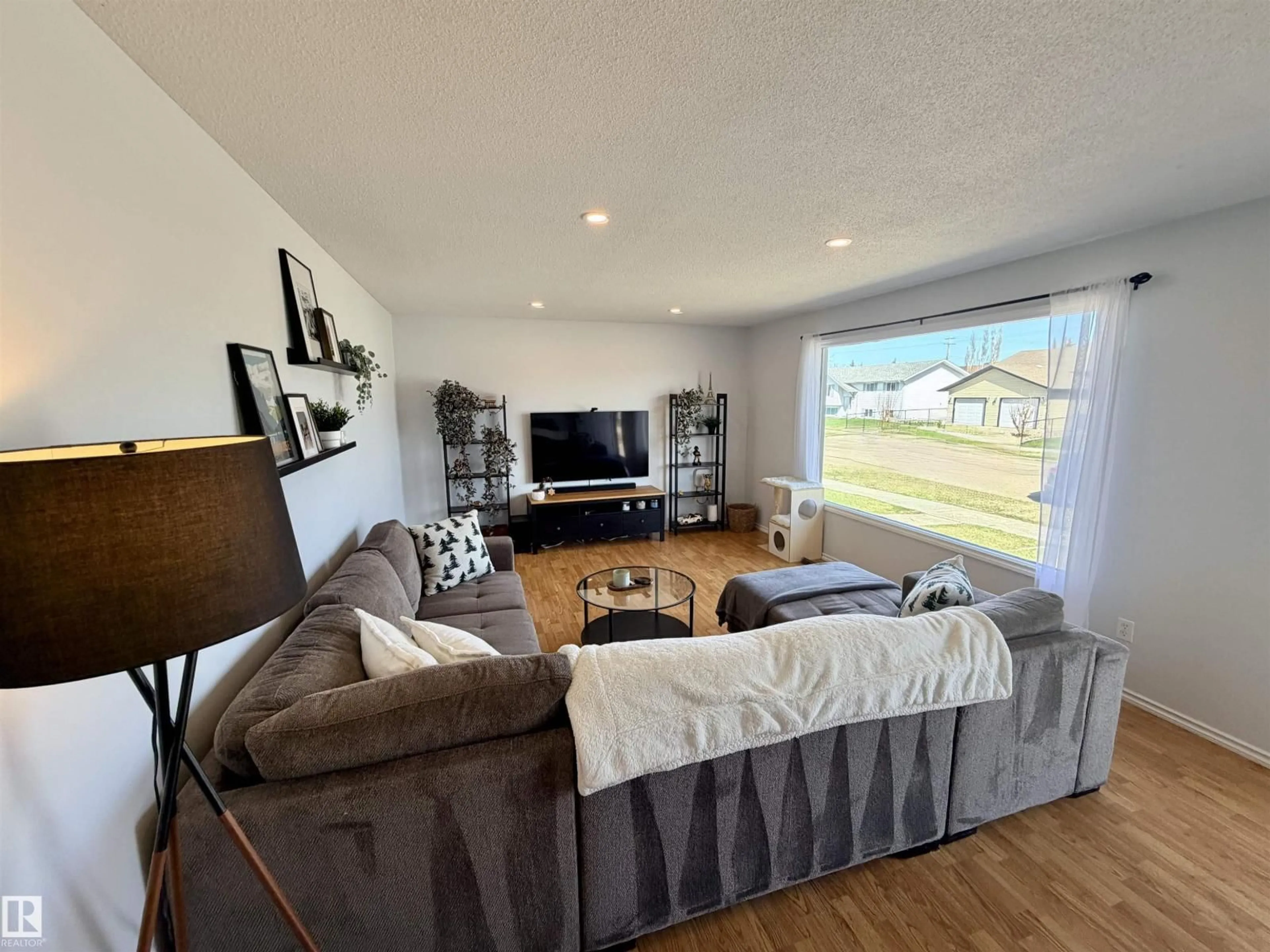 Living room with furniture, unknown for 4921 46 AV, St. Paul Town Alberta T0A3A3
