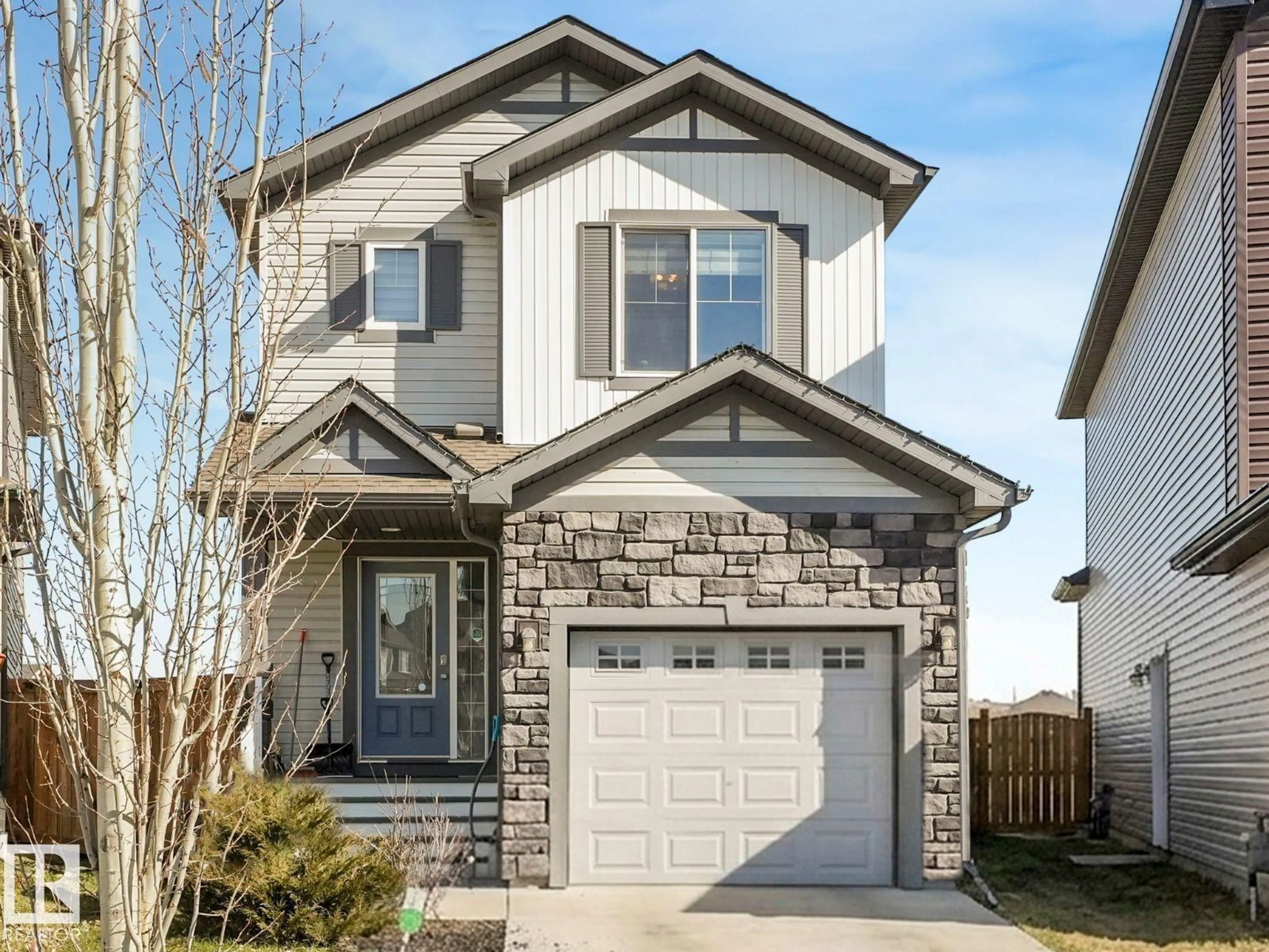 Home with vinyl exterior material, street for 17171 38 ST, Edmonton Alberta T5Y3R7