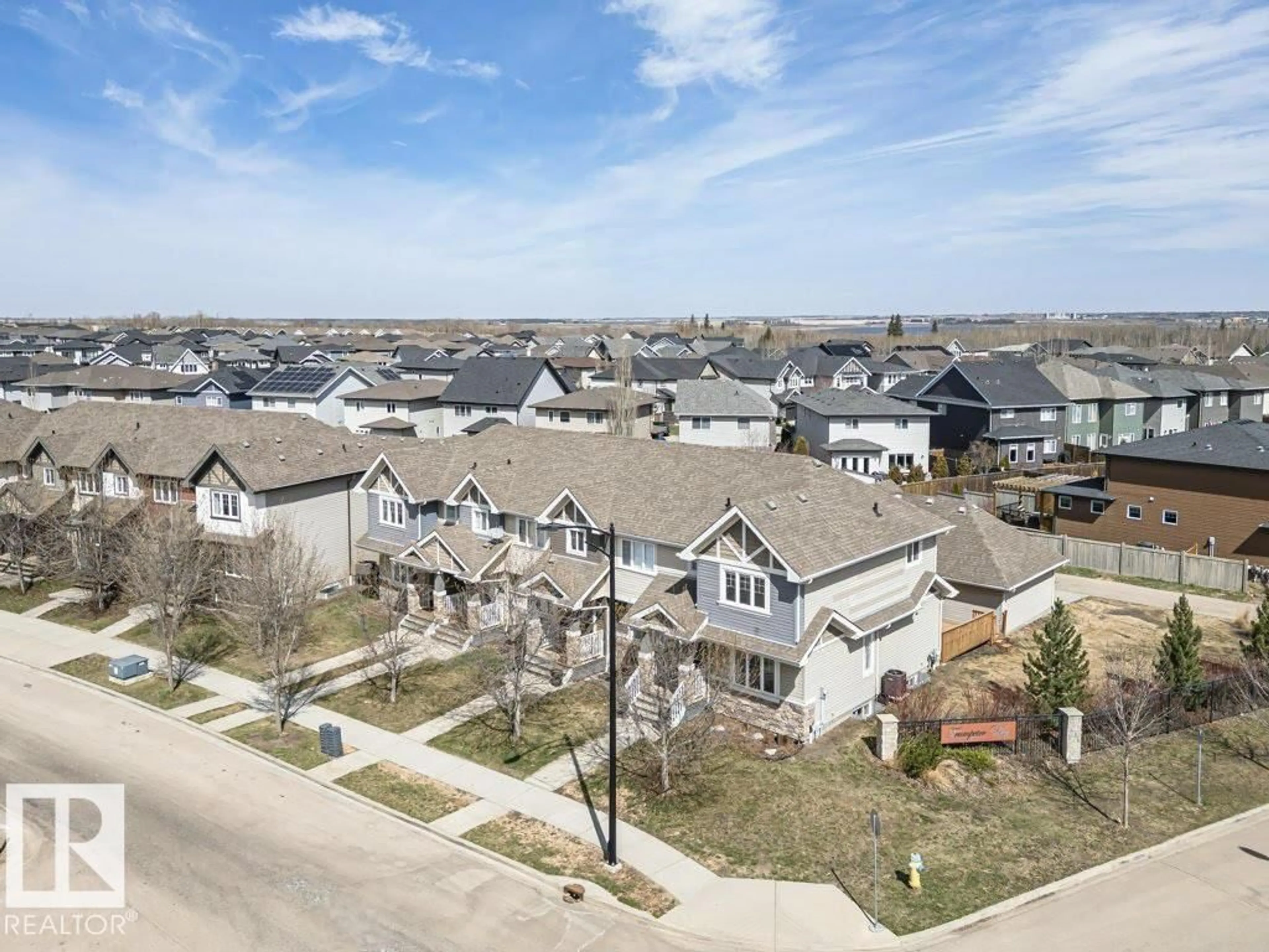 A pic from outside/outdoor area/front of a property/back of a property/a pic from drone, street for 2146 TRUMPETER WY, Edmonton Alberta T5S0G4