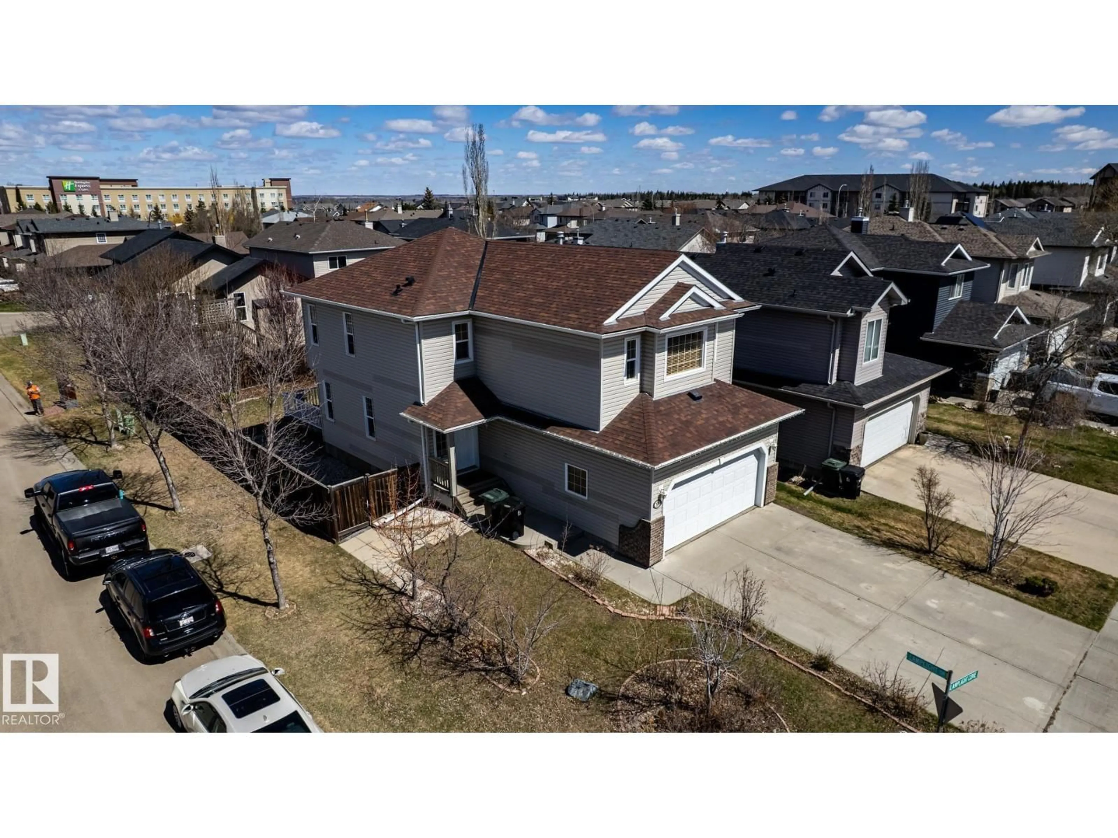 A pic from outside/outdoor area/front of a property/back of a property/a pic from drone, street for 55 LAMPLIGHT CV, Spruce Grove Alberta T7X4R2