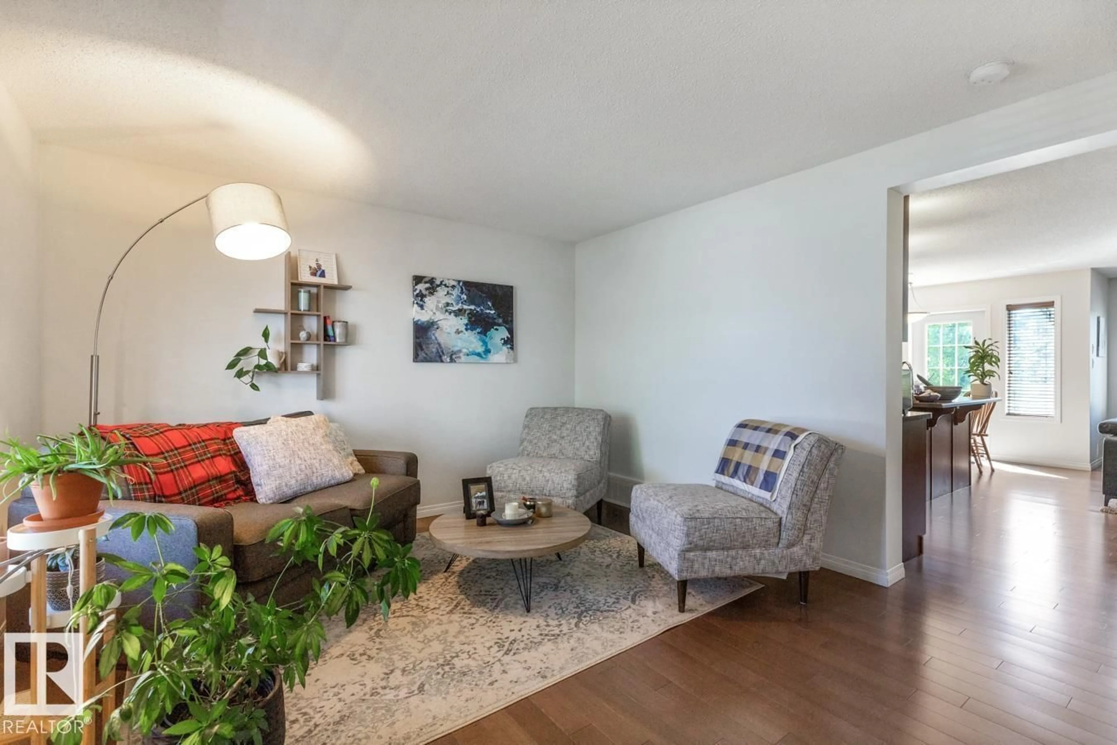 Living room with furniture, wood/laminate floor for 7641 SCHMID CR, Edmonton Alberta T6R0K8