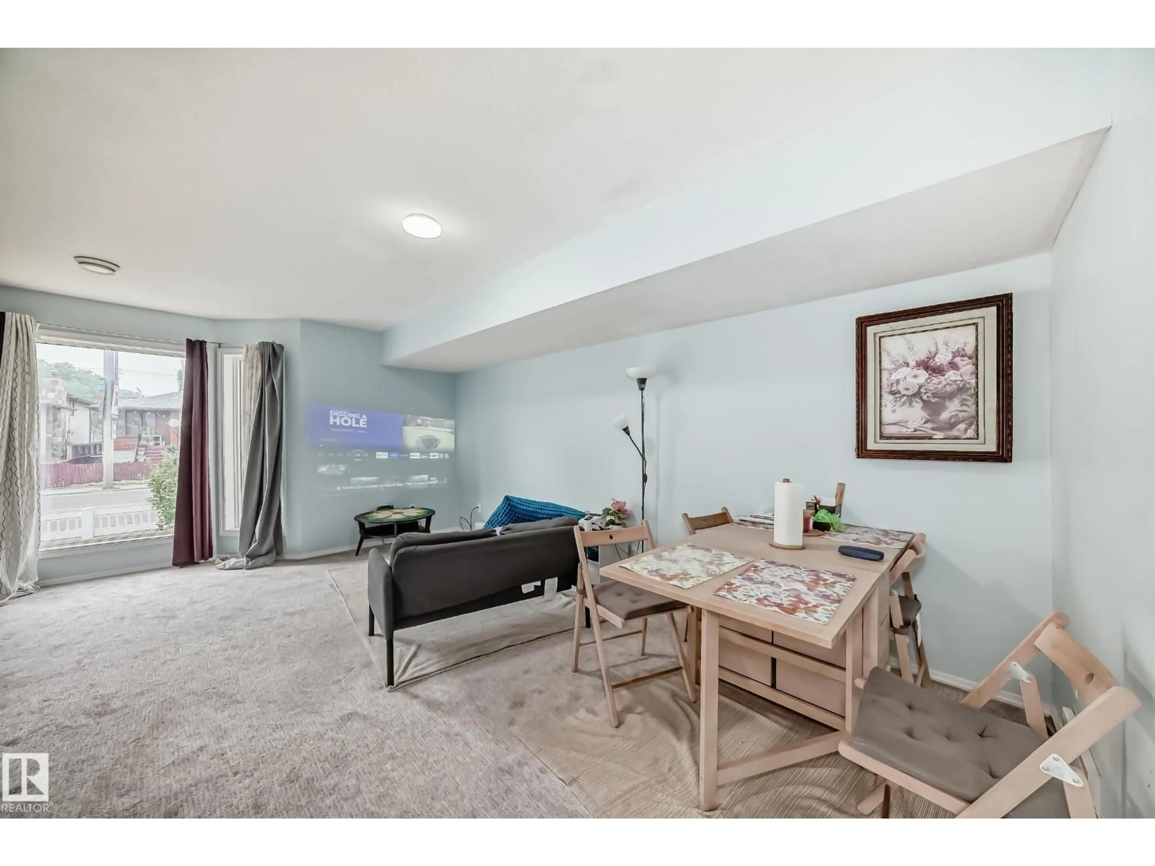 Living room with furniture, unknown for NW - 10711A 95 ST, Edmonton Alberta T5H2C8