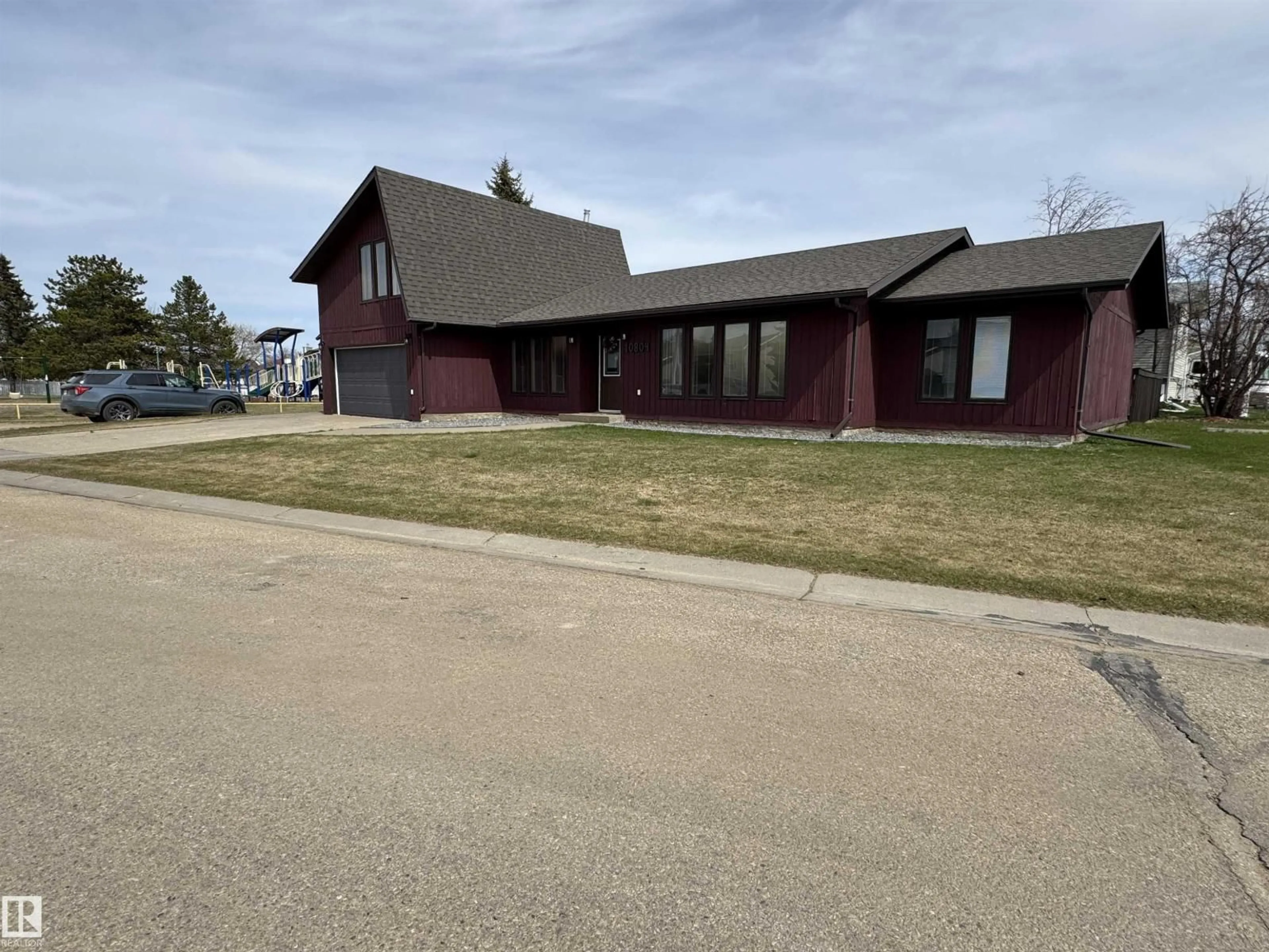 A pic from outside/outdoor area/front of a property/back of a property/a pic from drone, street for 10804 107 ST, Westlock Alberta T7P1C3