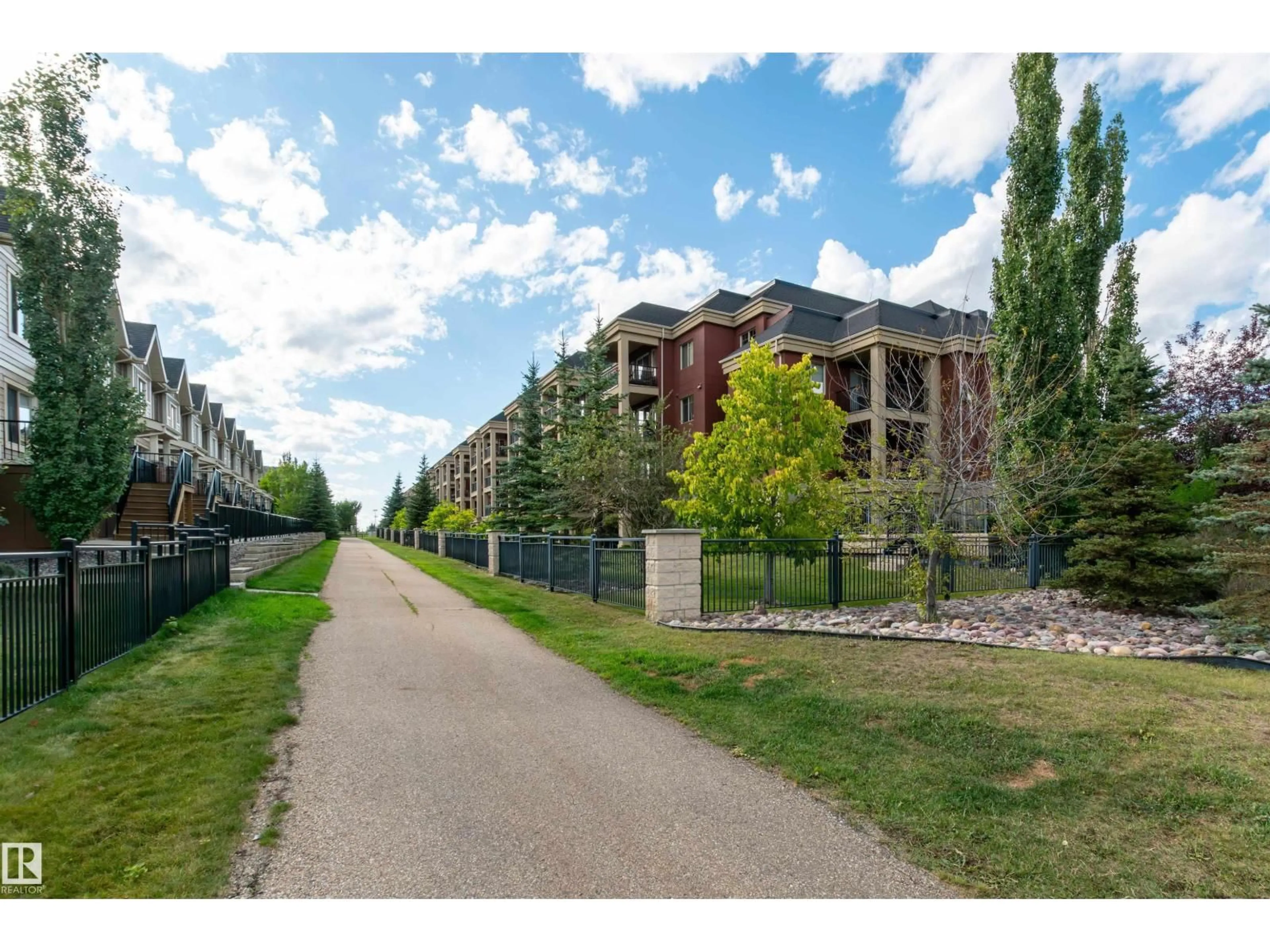 A pic from outside/outdoor area/front of a property/back of a property/a pic from drone, street for #301 - 501 PALISADES WY, Sherwood Park Alberta T8H0H8