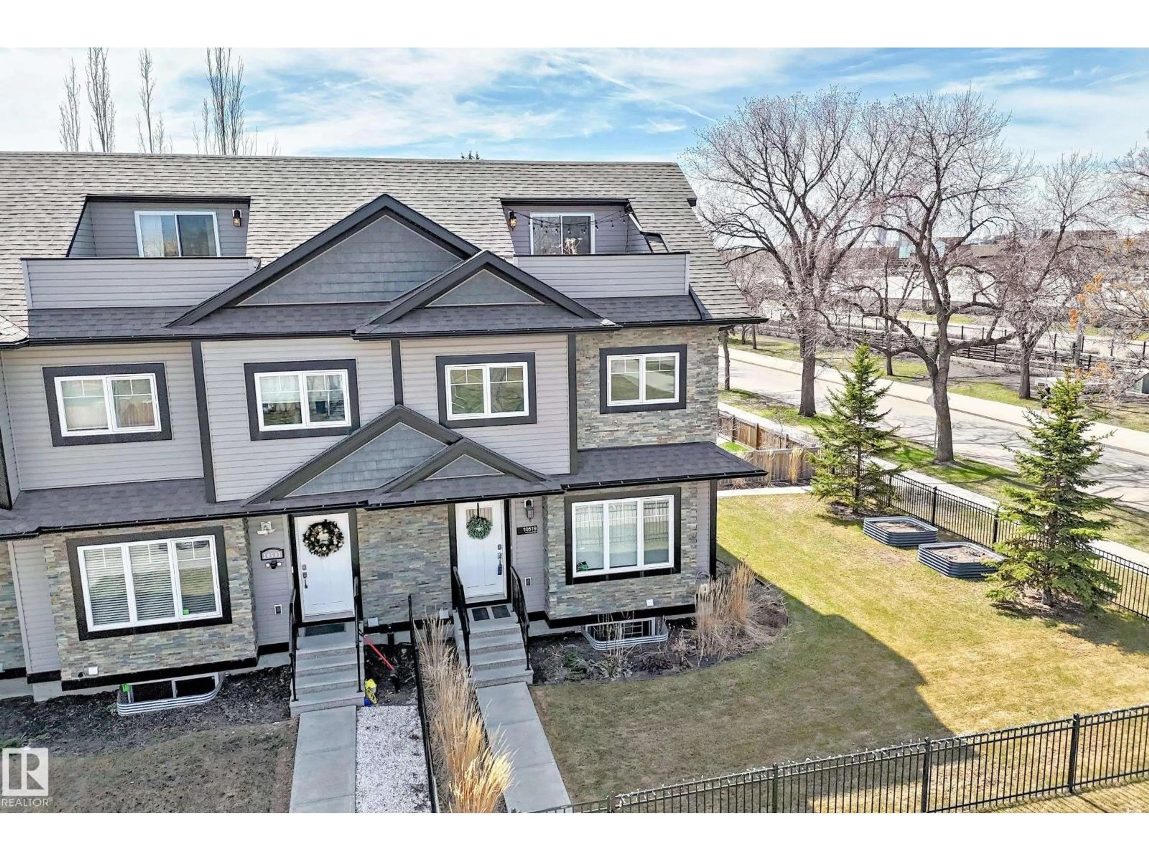 A pic from outside/outdoor area/front of a property/back of a property/a pic from drone, street for 10519 114 AV, Edmonton Alberta T5G1Z4