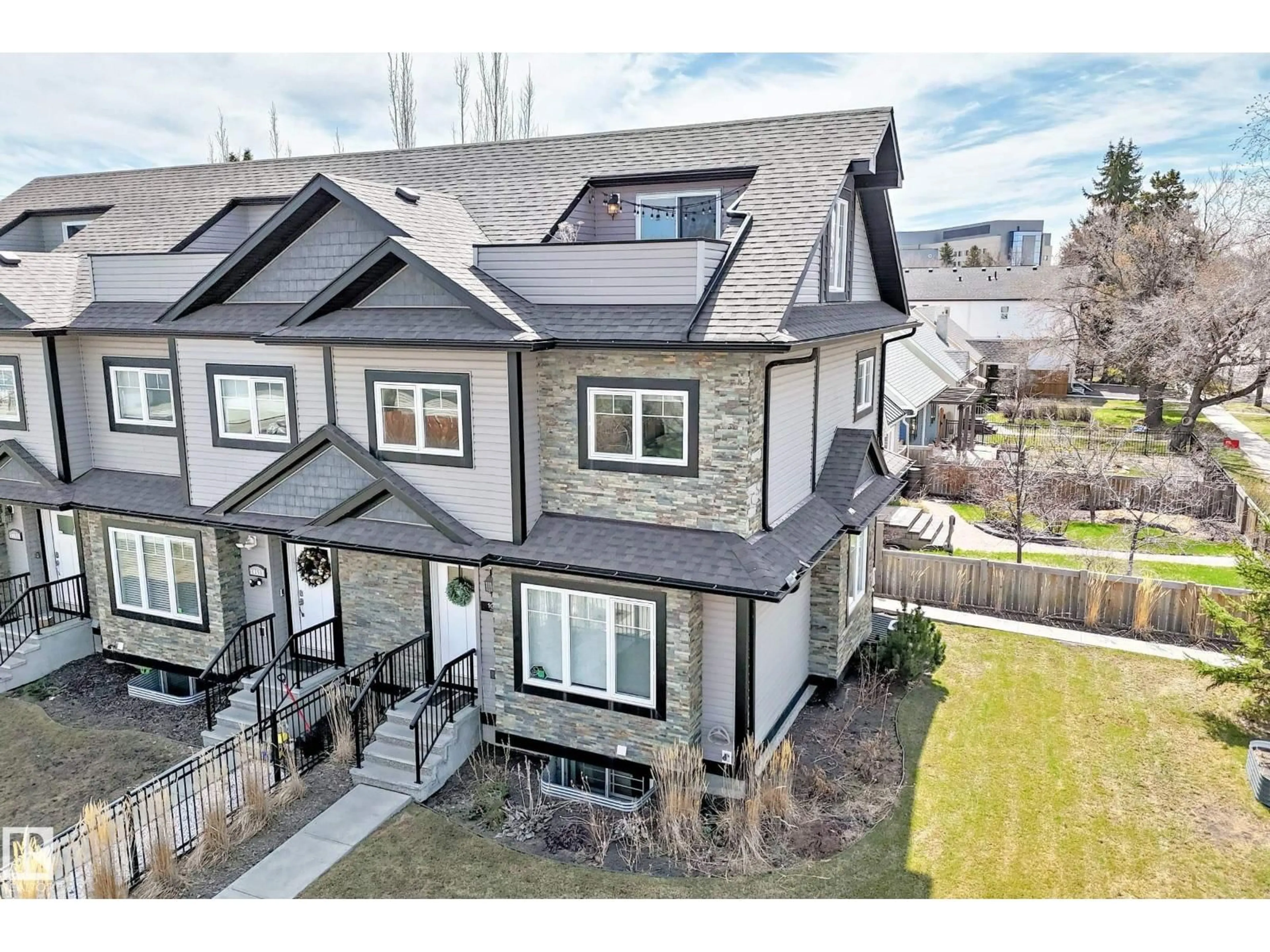 A pic from outside/outdoor area/front of a property/back of a property/a pic from drone, mountain view for 10519 114 AV, Edmonton Alberta T5G1Z4