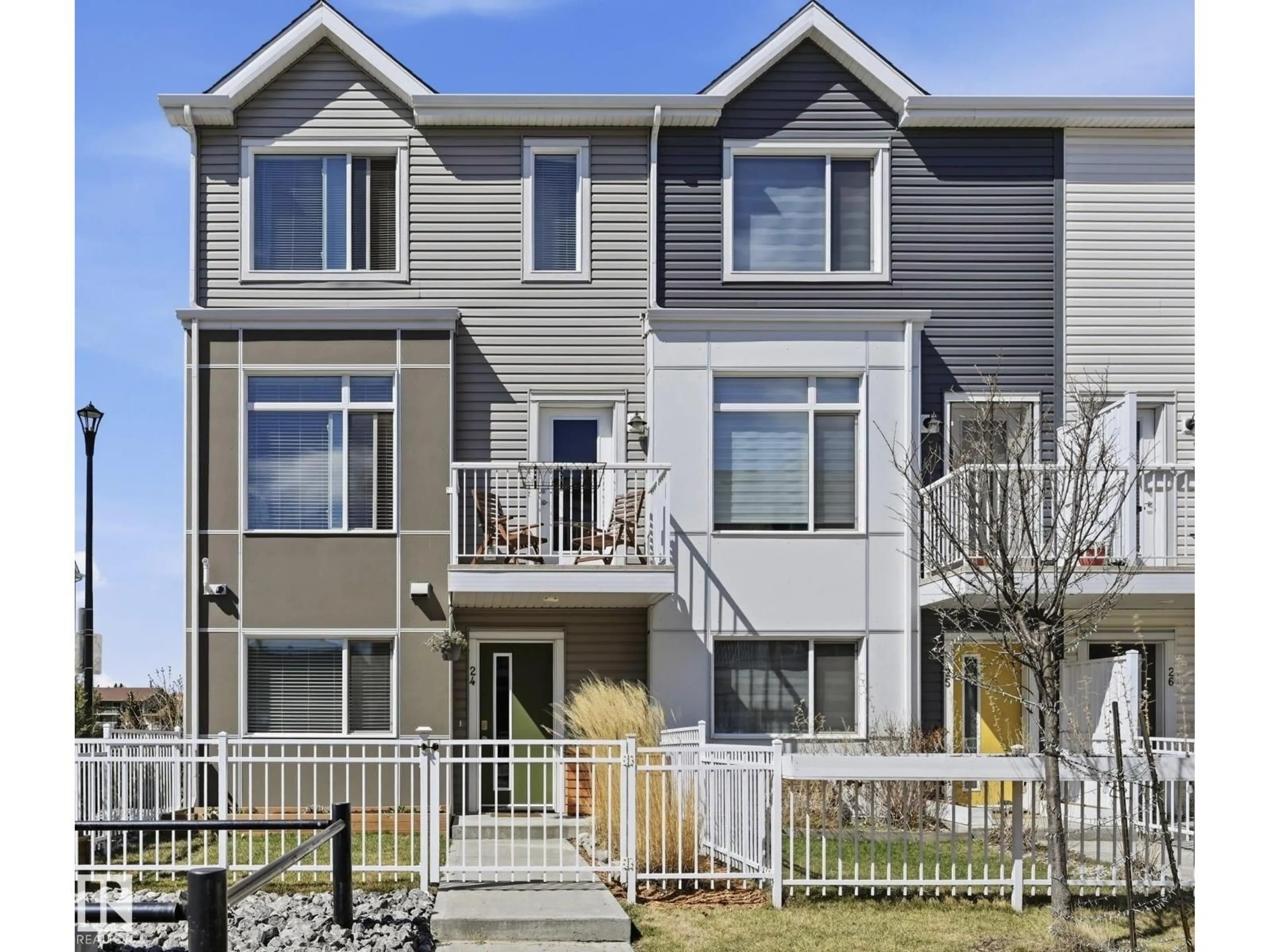 Home with vinyl exterior material, street for 24 215 SADDLEBACK RD, Edmonton Alberta T6J5T6