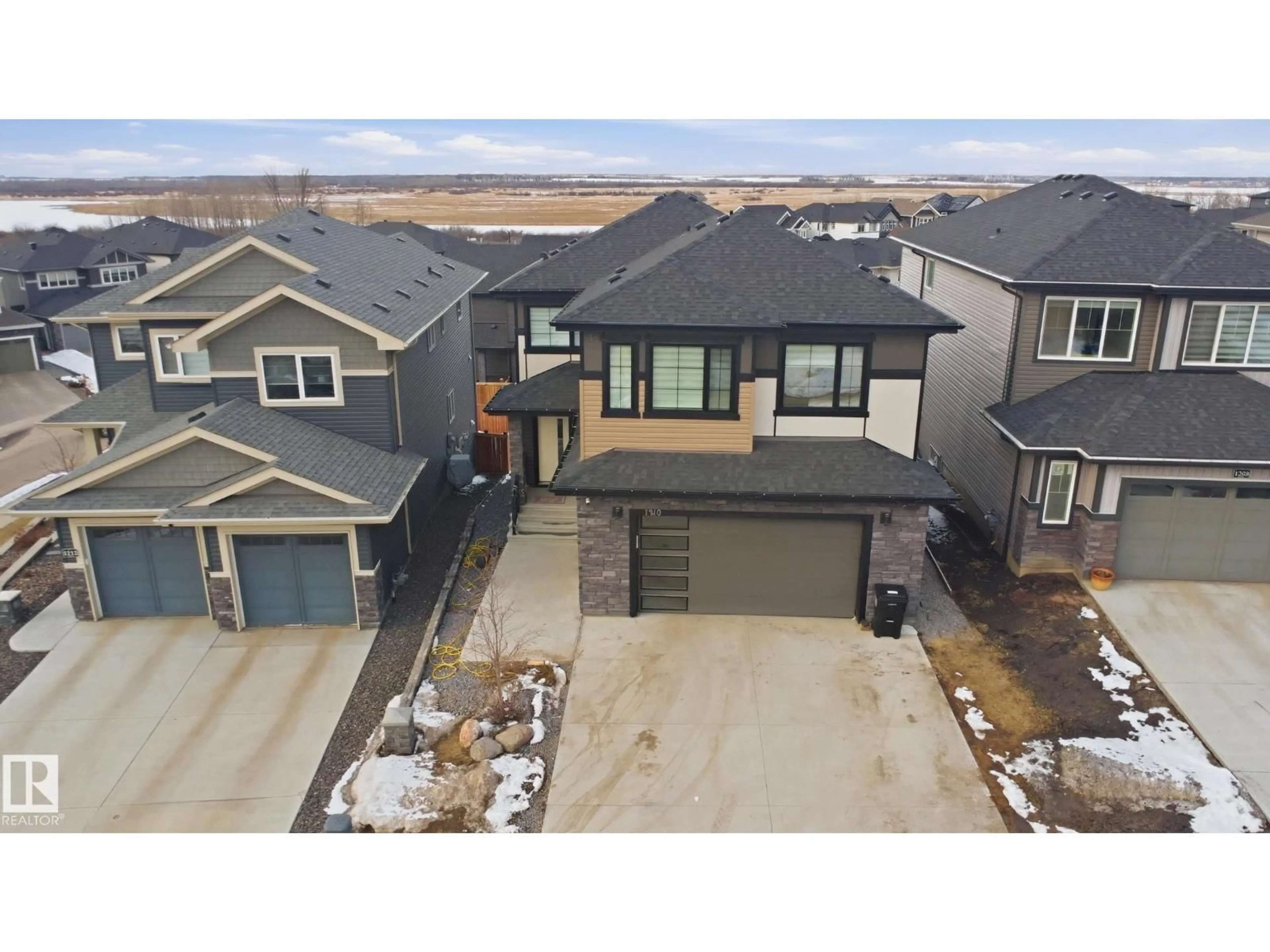 A pic from outside/outdoor area/front of a property/back of a property/a pic from drone, street for 1210 PEREGRINE TC, Edmonton Alberta T5S0M3
