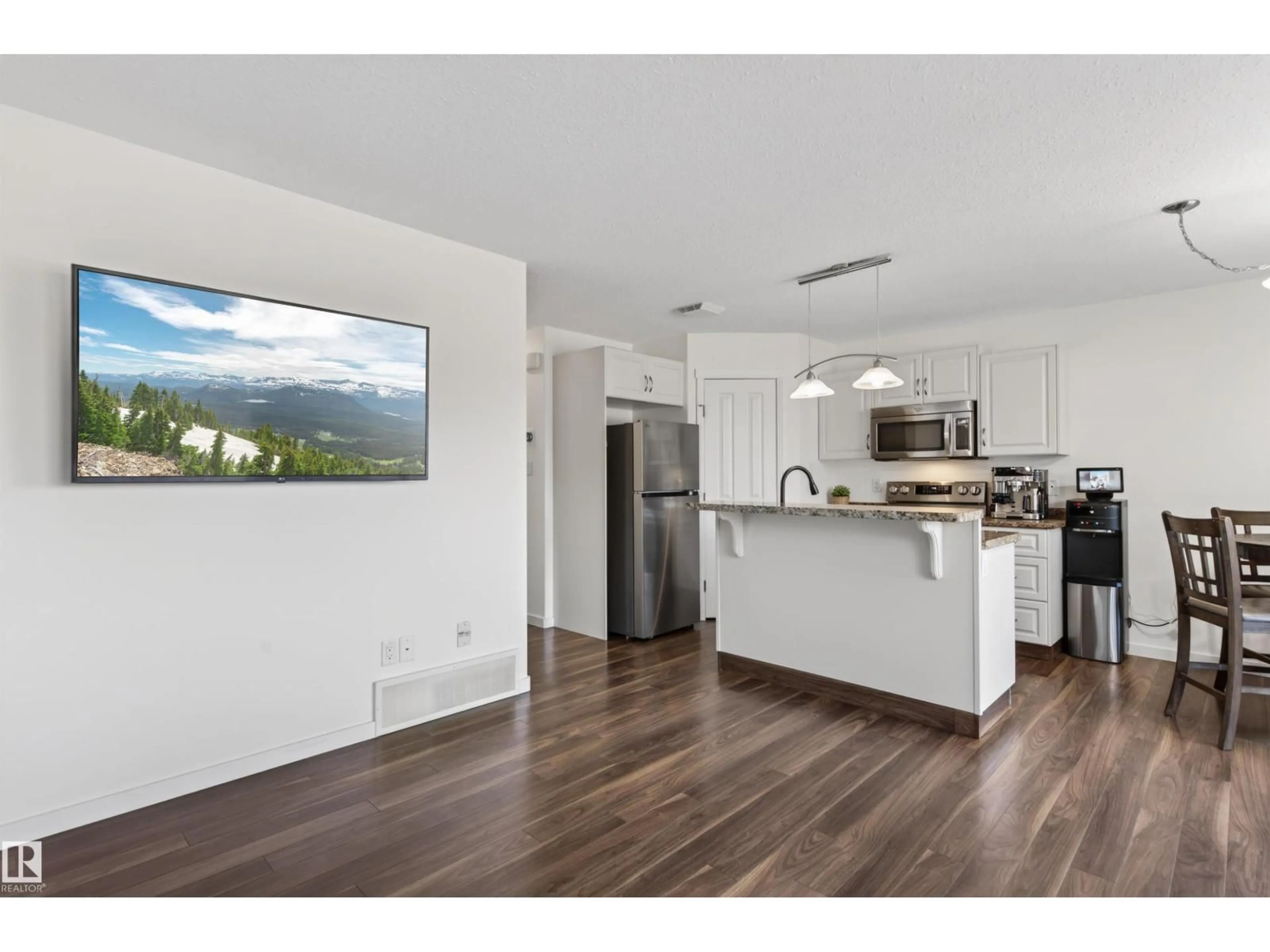 Open concept kitchen, wood/laminate floor for 702C ROCKY WY, Cold Lake Alberta T9M0H3