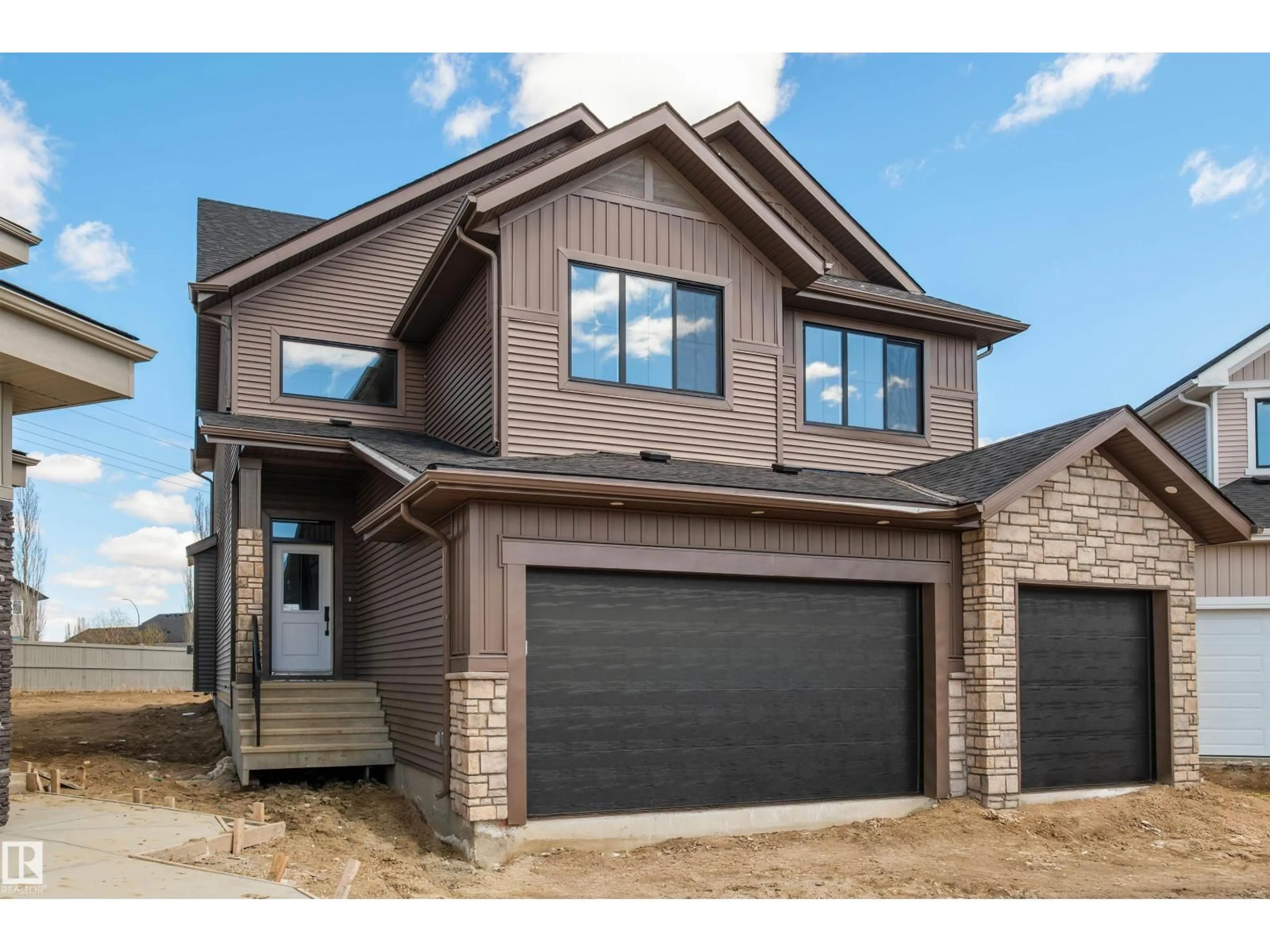 Home with brick exterior material, street for 157 GRAYBRIAR DR, Stony Plain Alberta T7Z0M7