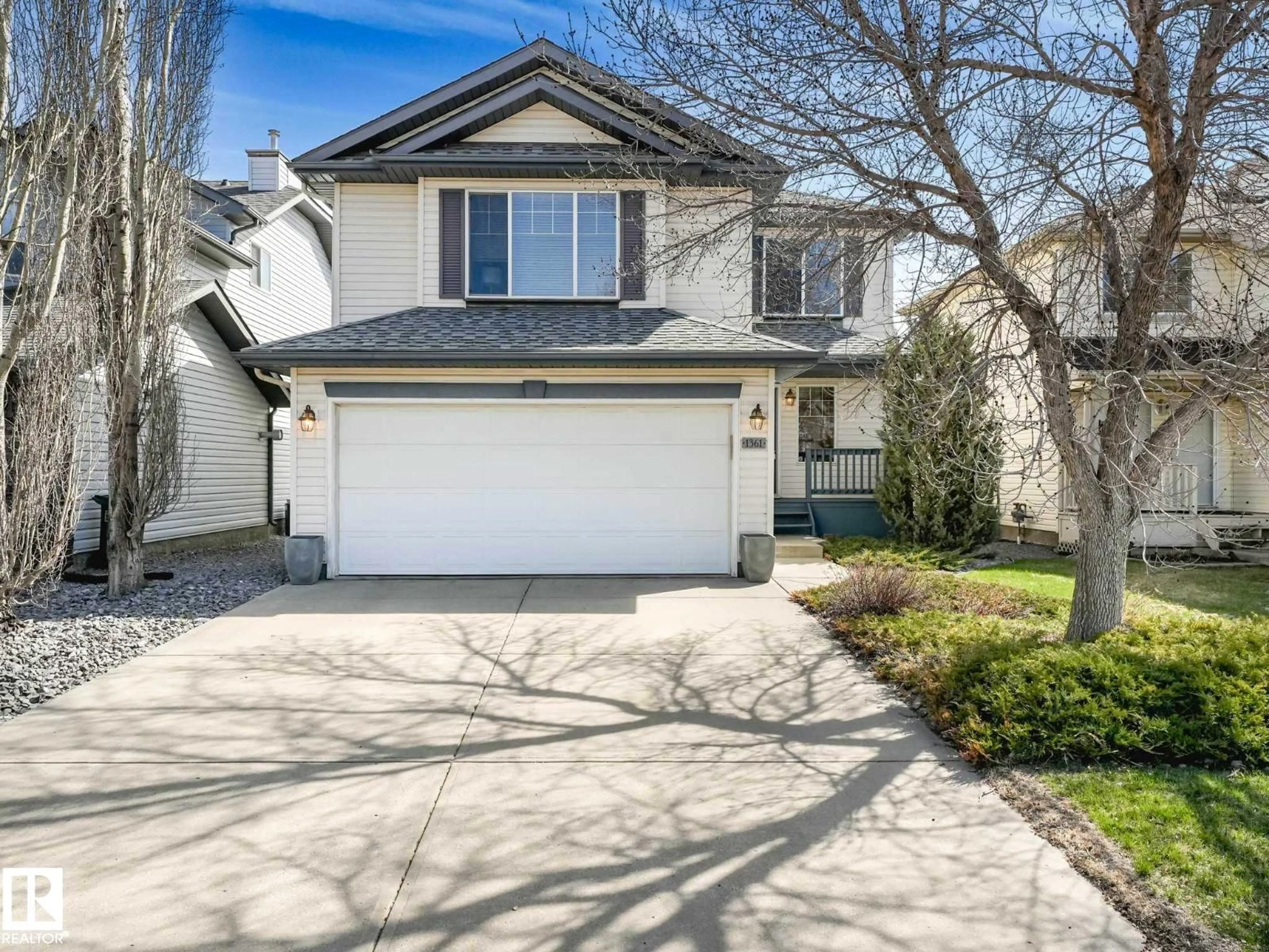 Home with vinyl exterior material, street for 1361 BRECKENRIDGE DR, Edmonton Alberta T5T6M2
