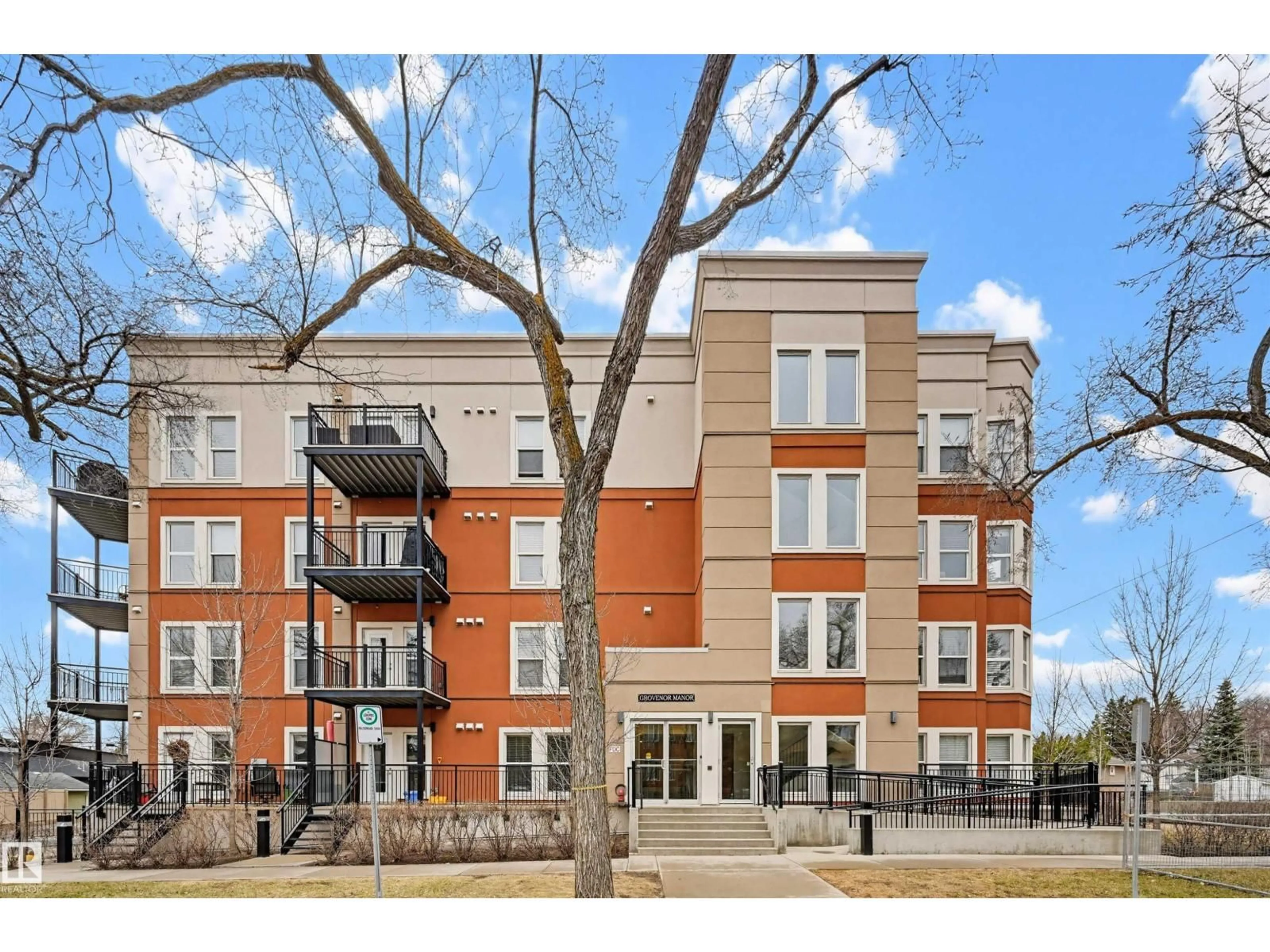 Home with brick exterior material, street for 405 - 10126 144 ST, Edmonton Alberta T5N2T7