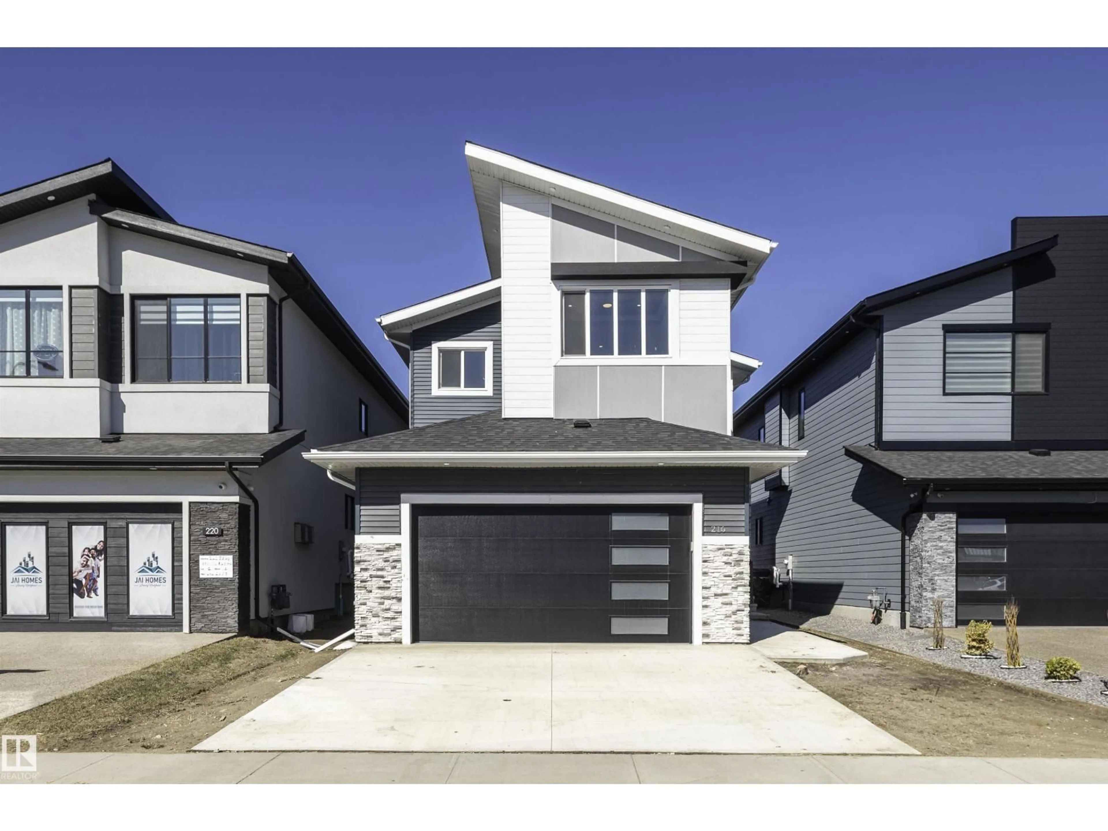Home with vinyl exterior material, street for 216 23 ST, Edmonton Alberta T6X3C7