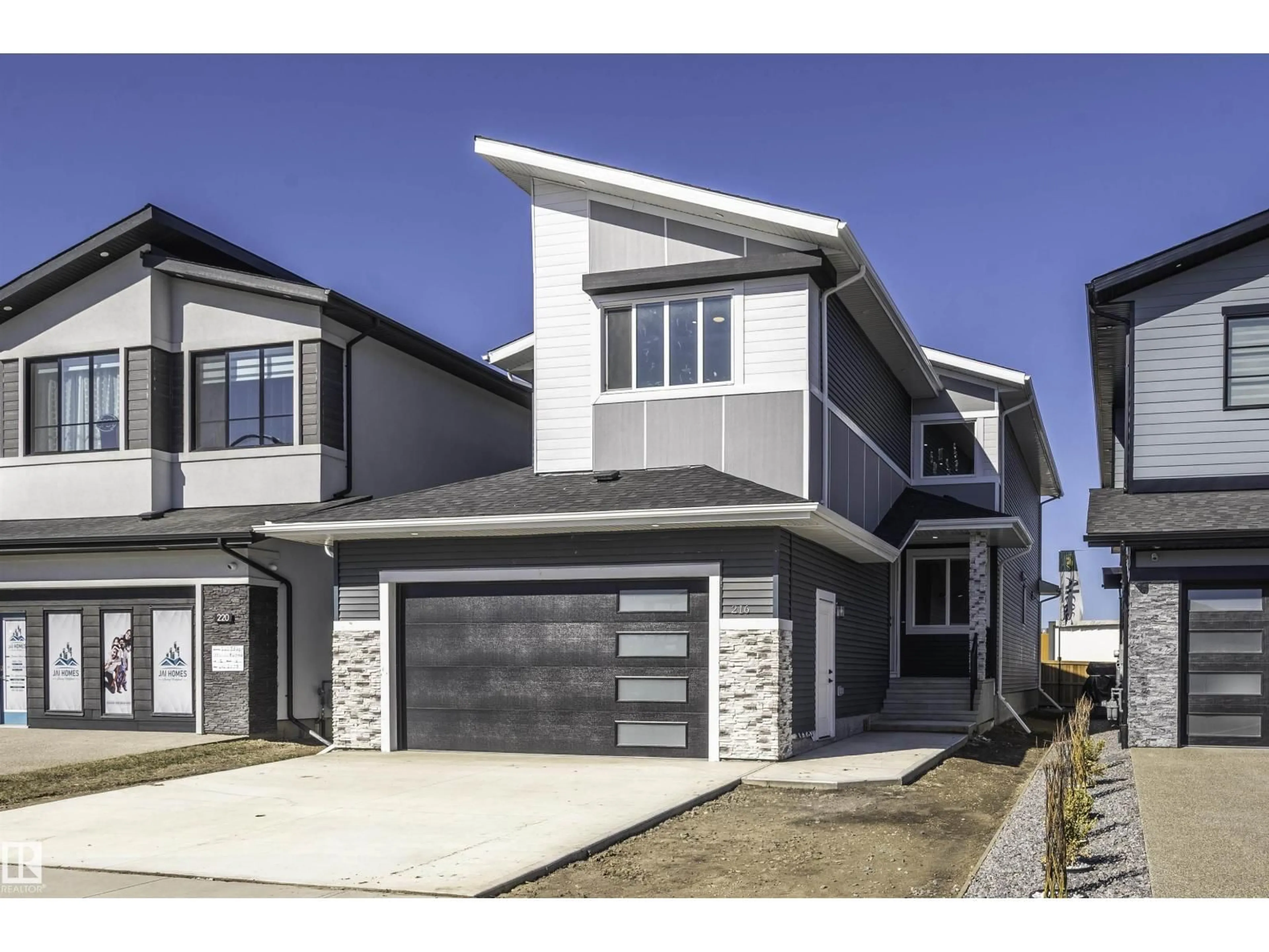 Home with vinyl exterior material, street for 216 23 ST, Edmonton Alberta T6X3C7