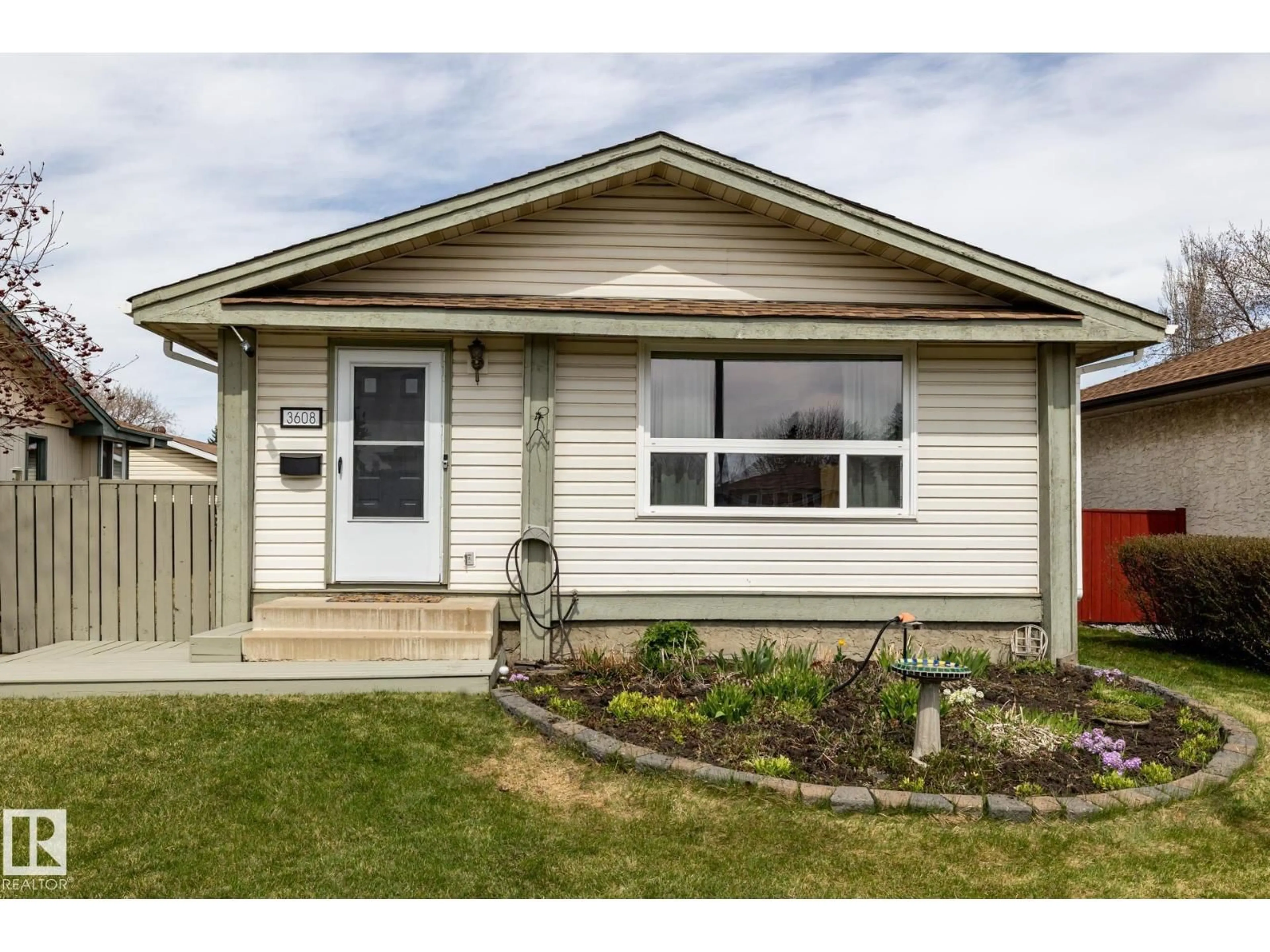 Home with vinyl exterior material, street for 3608 16A AV, Edmonton Alberta T6L2N4
