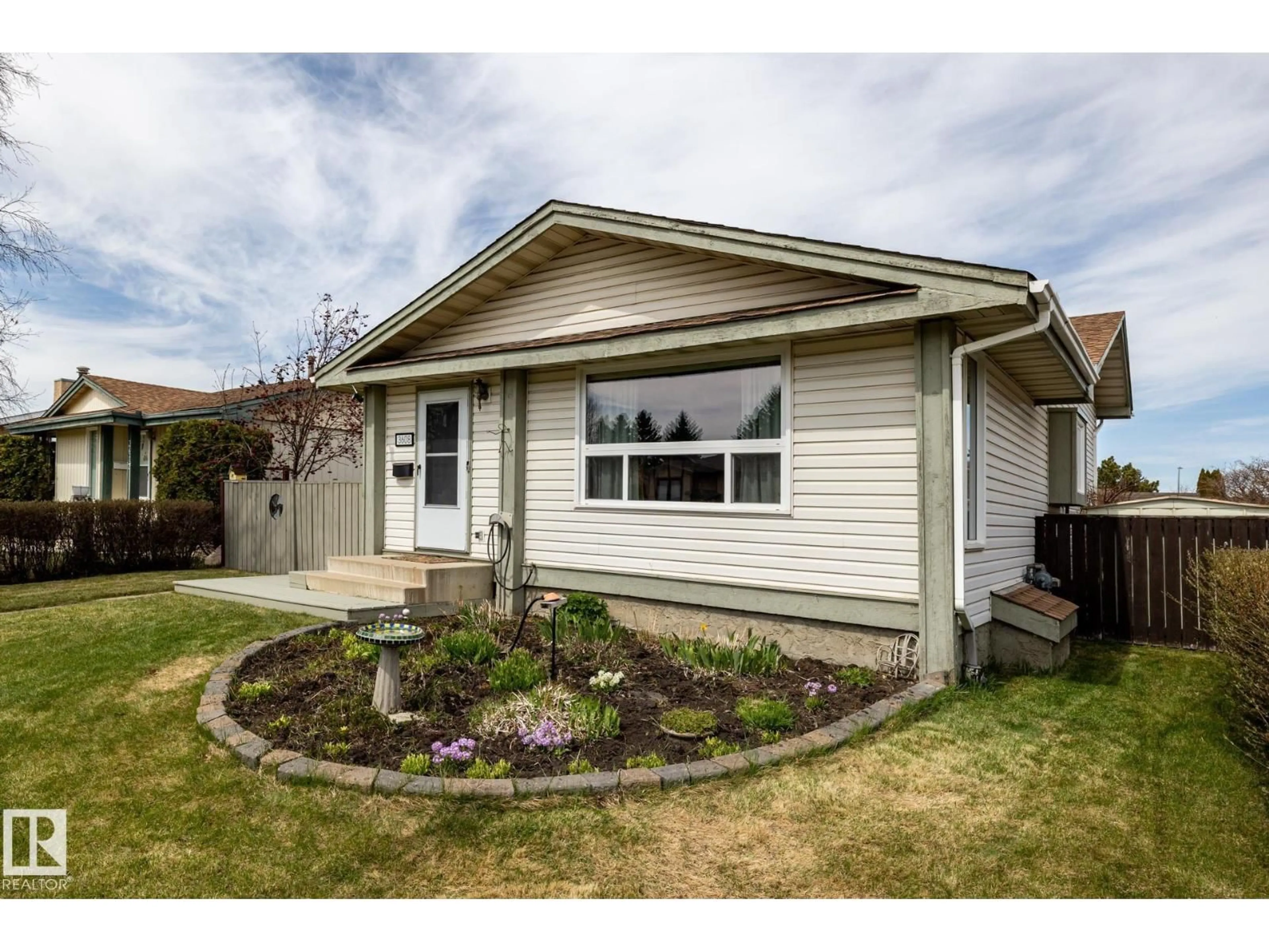 Home with vinyl exterior material, street for 3608 16A AV, Edmonton Alberta T6L2N4