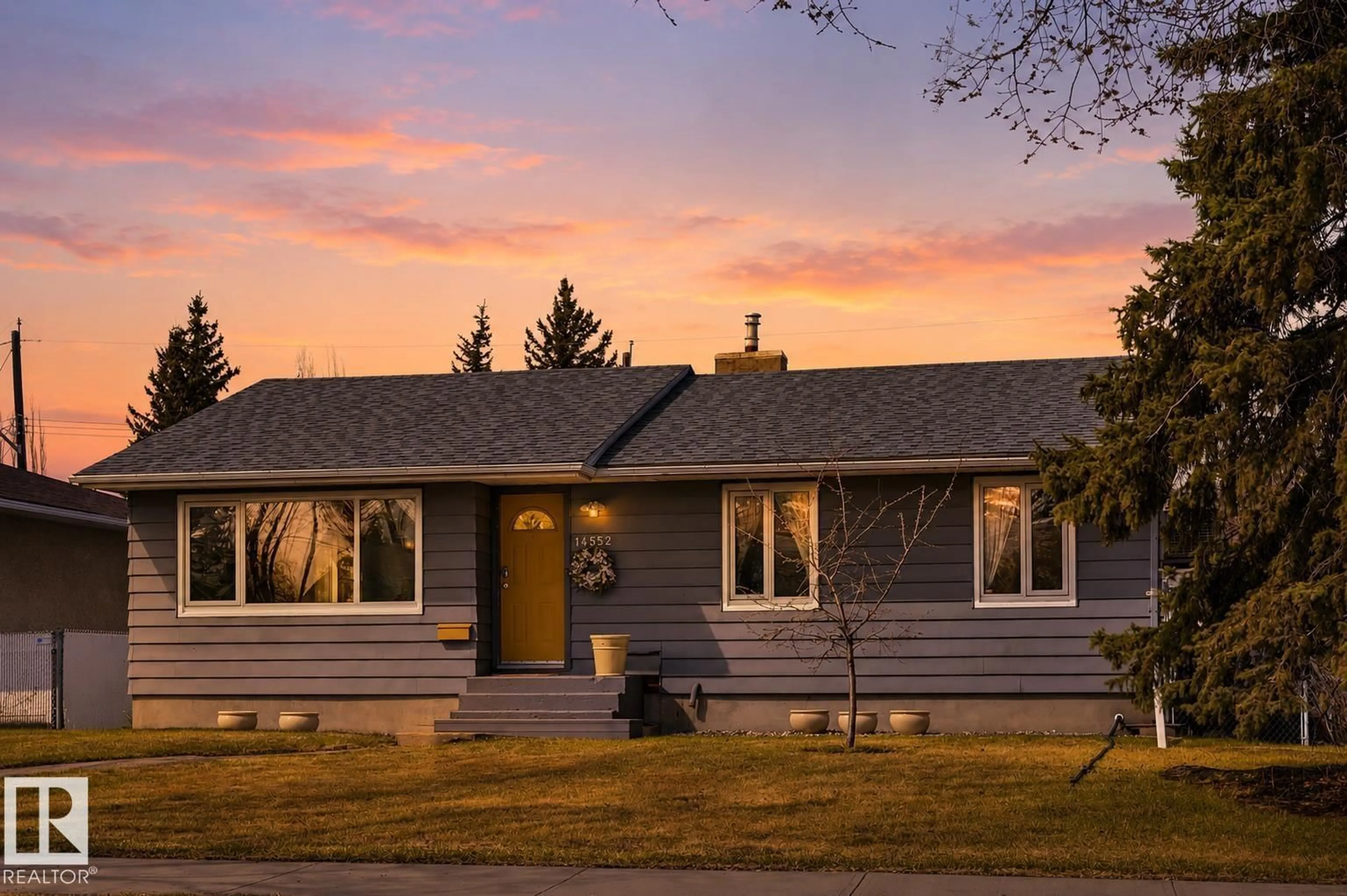 Home with vinyl exterior material, street for 14552 107A AV, Edmonton Alberta T5N1G5