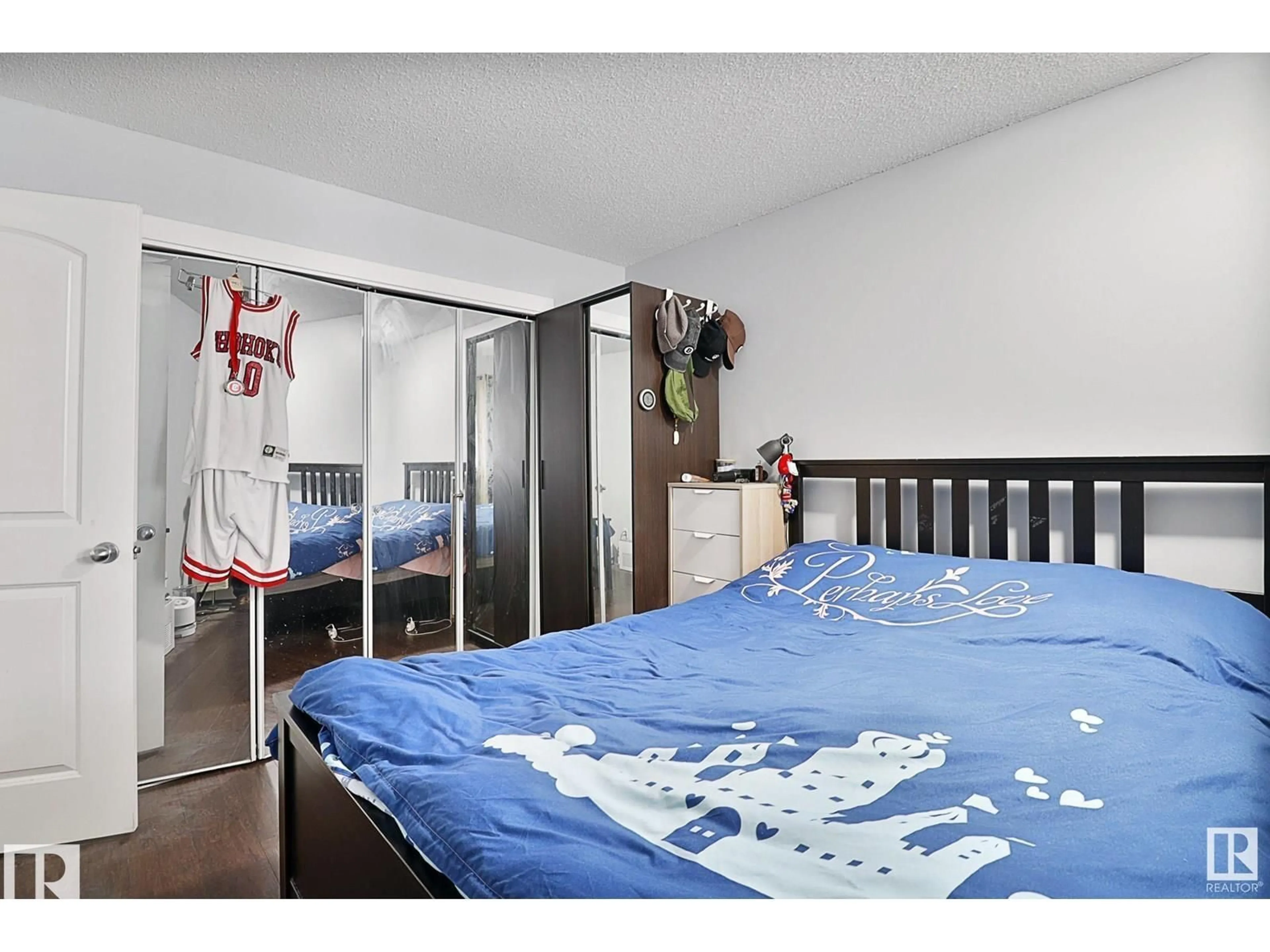 Bedroom with bed, wood/laminate floor for #207 - 10138 116 ST NW, Edmonton Alberta T5K1V8
