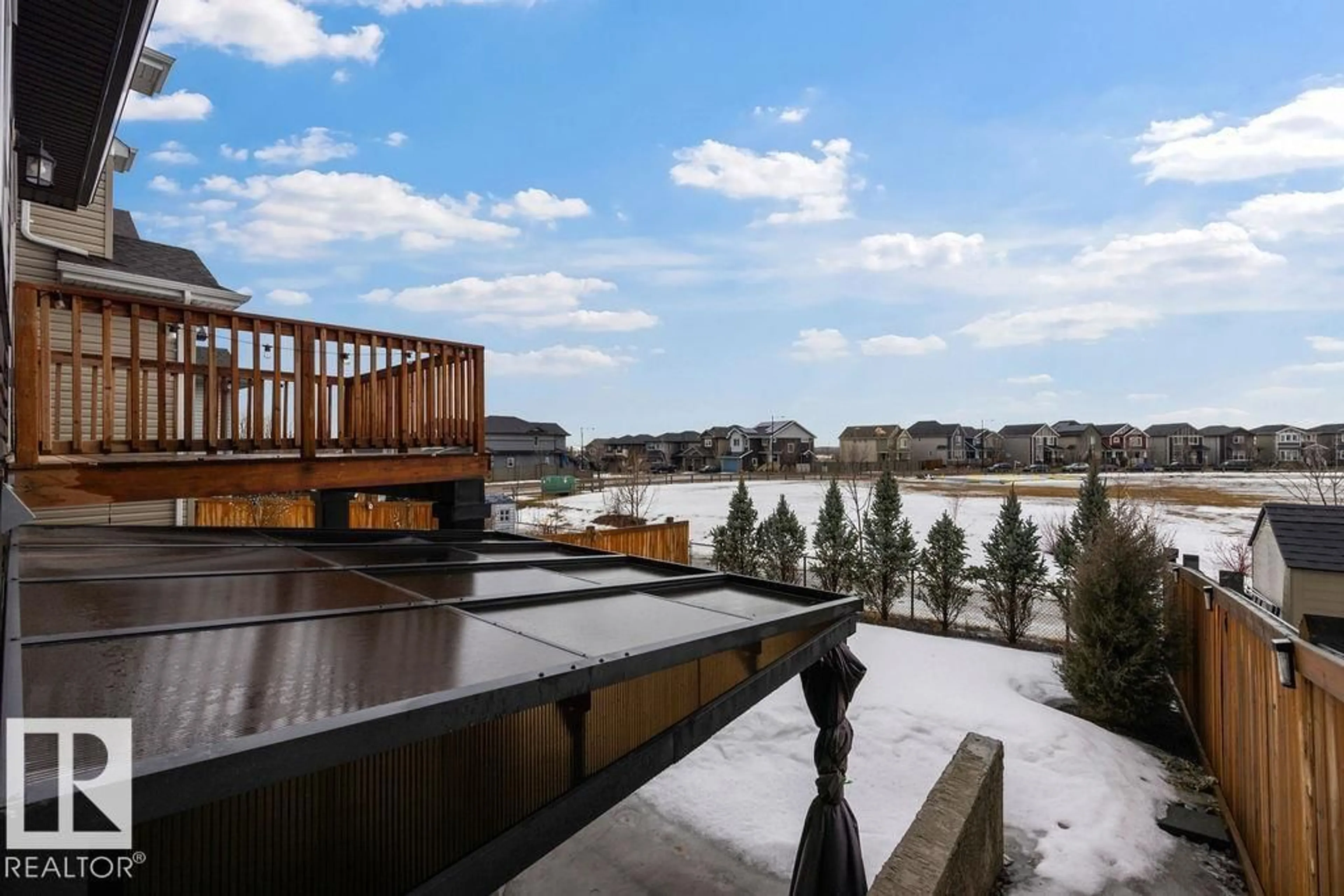 Patio, water/lake/river/ocean view for 1057 COOPERS HAWK LI, Edmonton Alberta T5S0M2