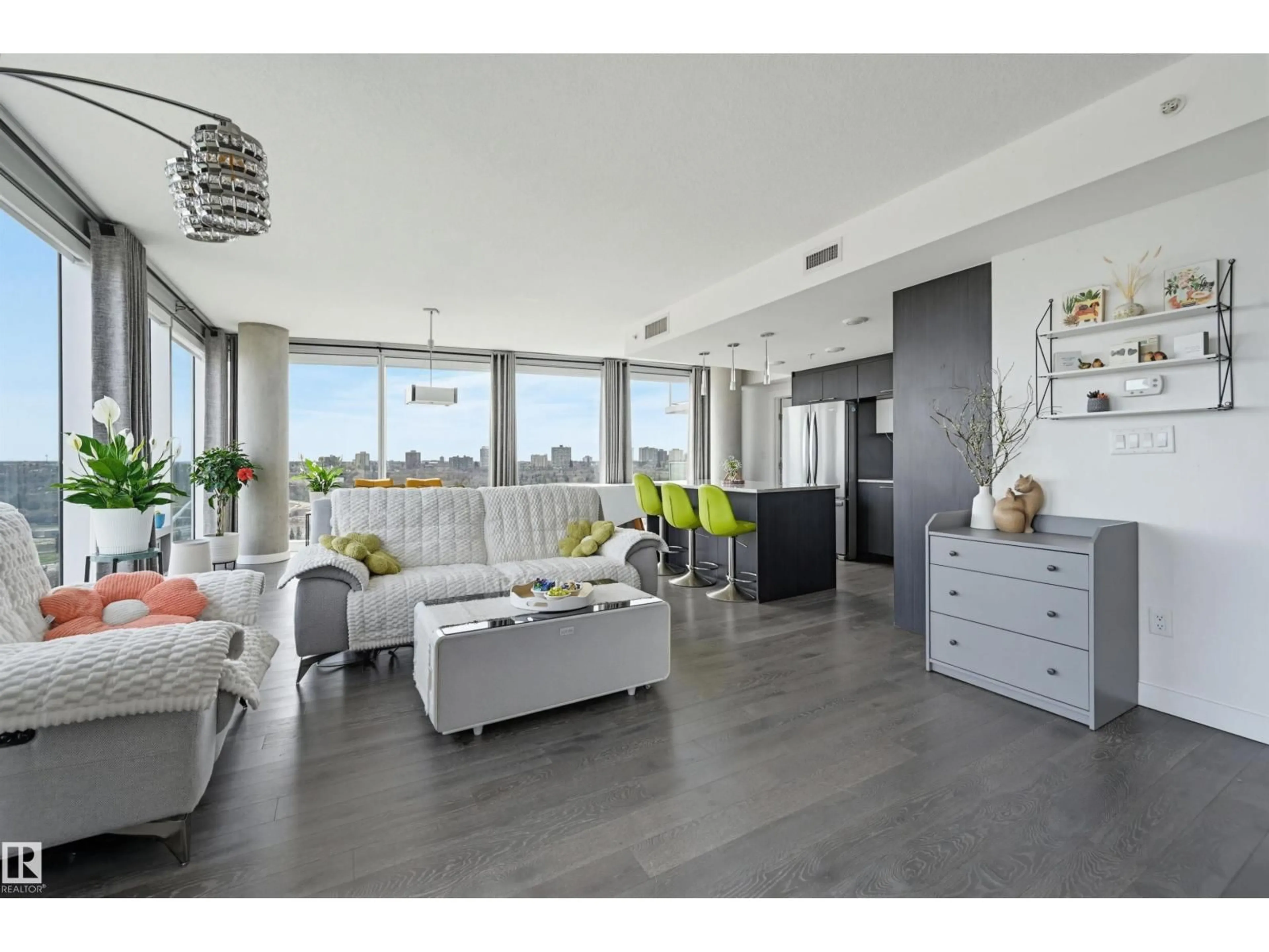 Living room with furniture, wood/laminate floor for 9720 - 1605 106 ST, Edmonton Alberta T5K0K8
