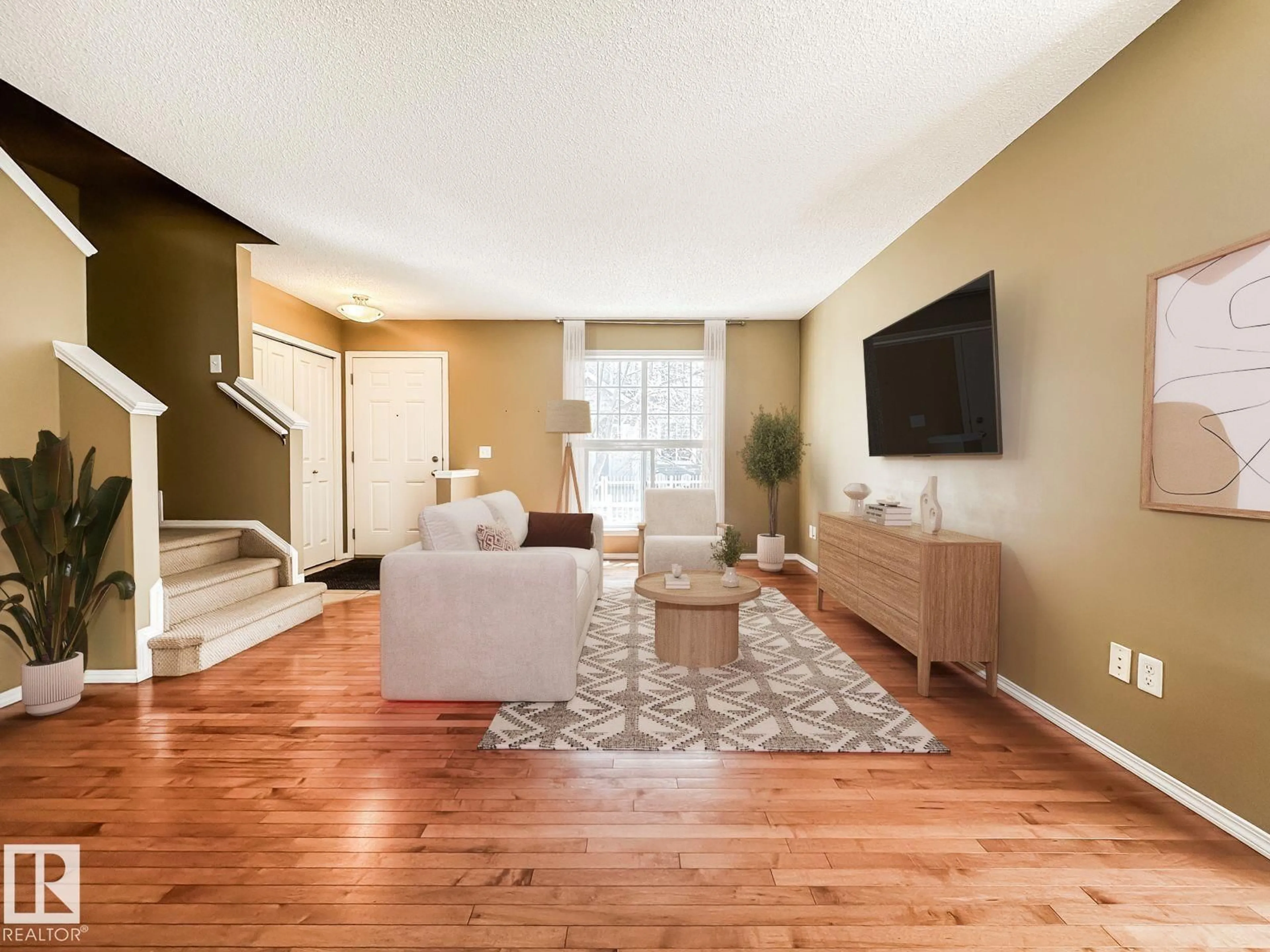 Living room with furniture, unknown for #101 - 2051 TOWNE CENTRE BV, Edmonton Alberta T6R0G8