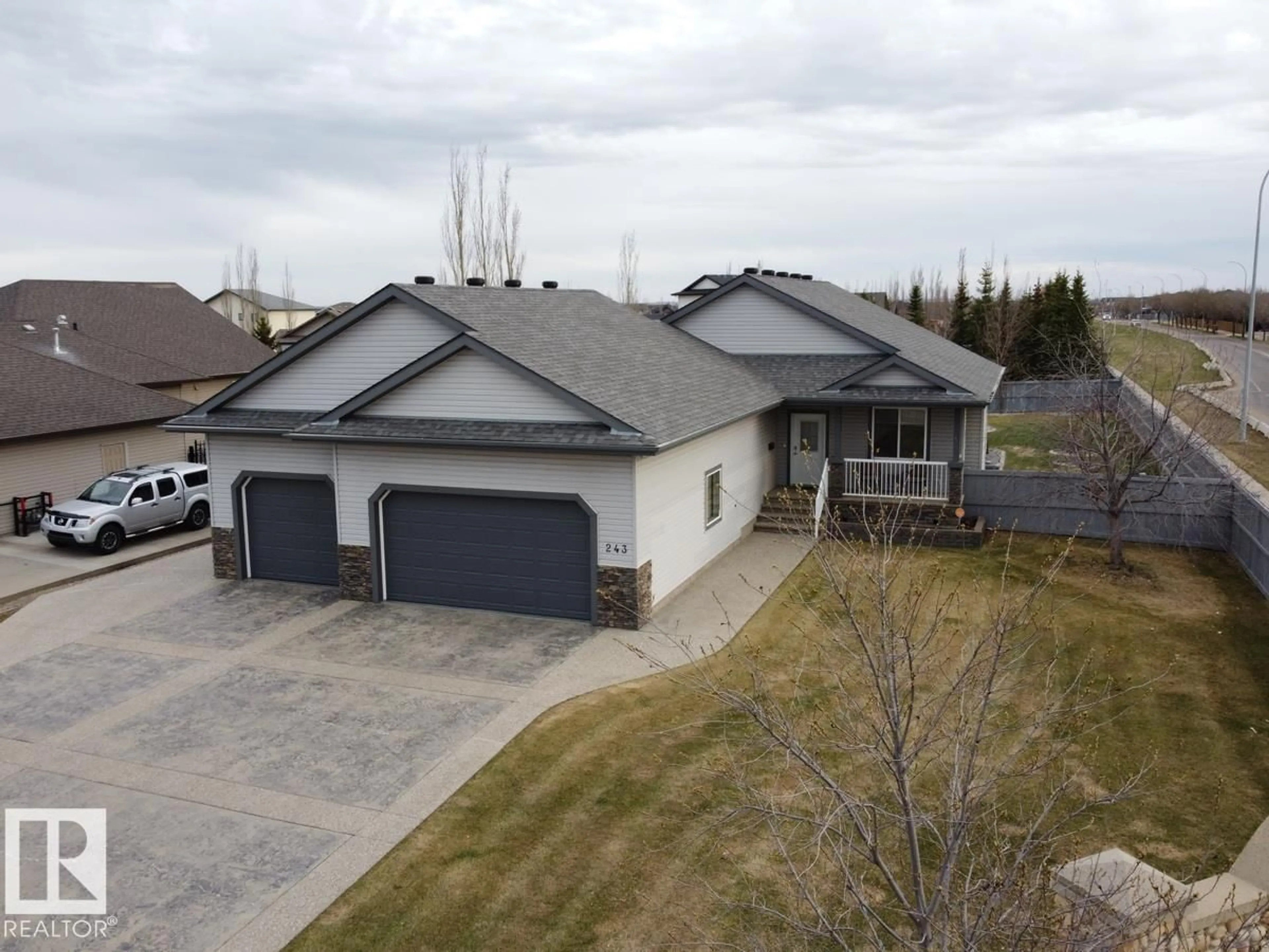 A pic from outside/outdoor area/front of a property/back of a property/a pic from drone, street for 243 GREENFIELD WY, Fort Saskatchewan Alberta T8L0B3